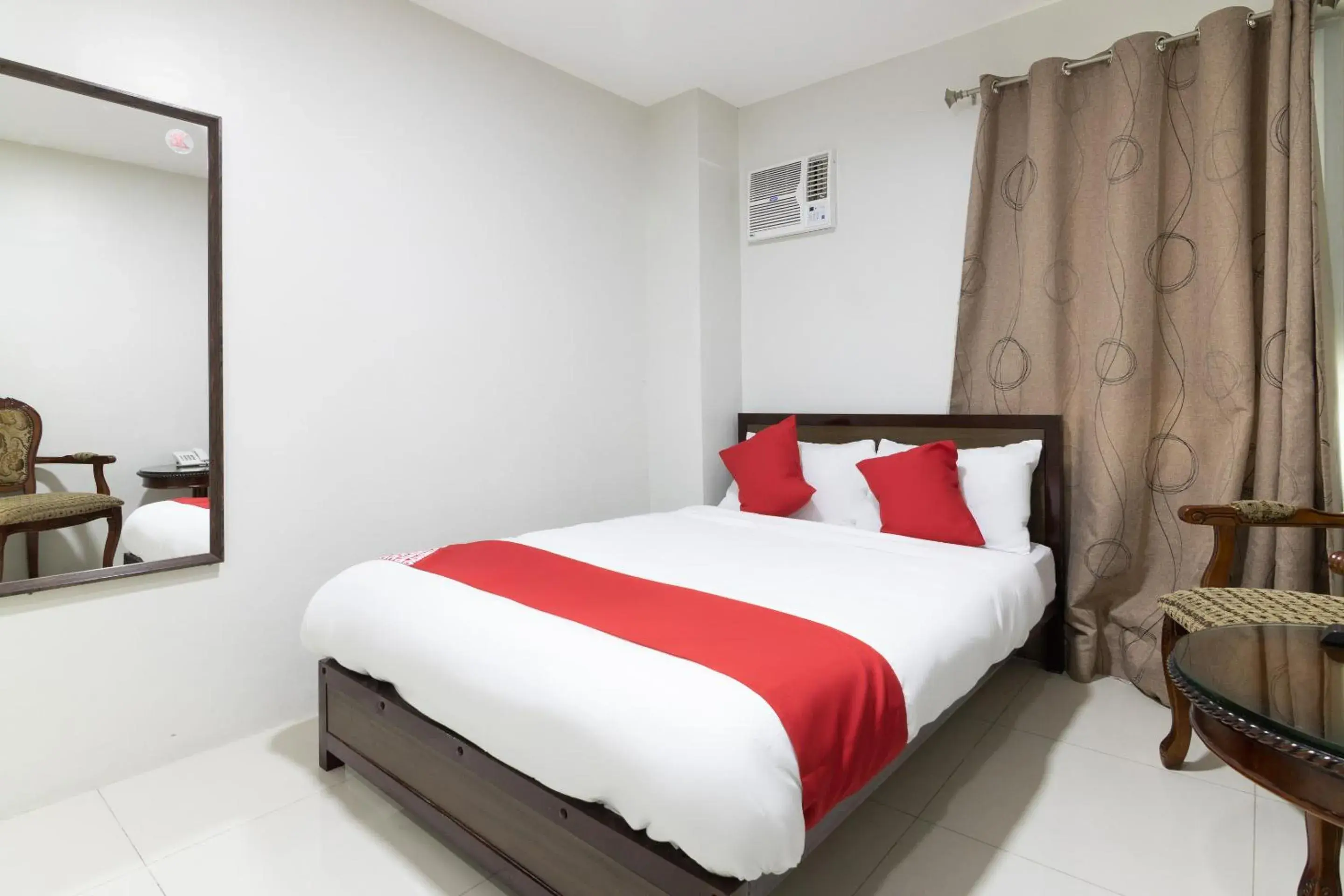 Bedroom, Bed in OYO 152 Sangco Condotel