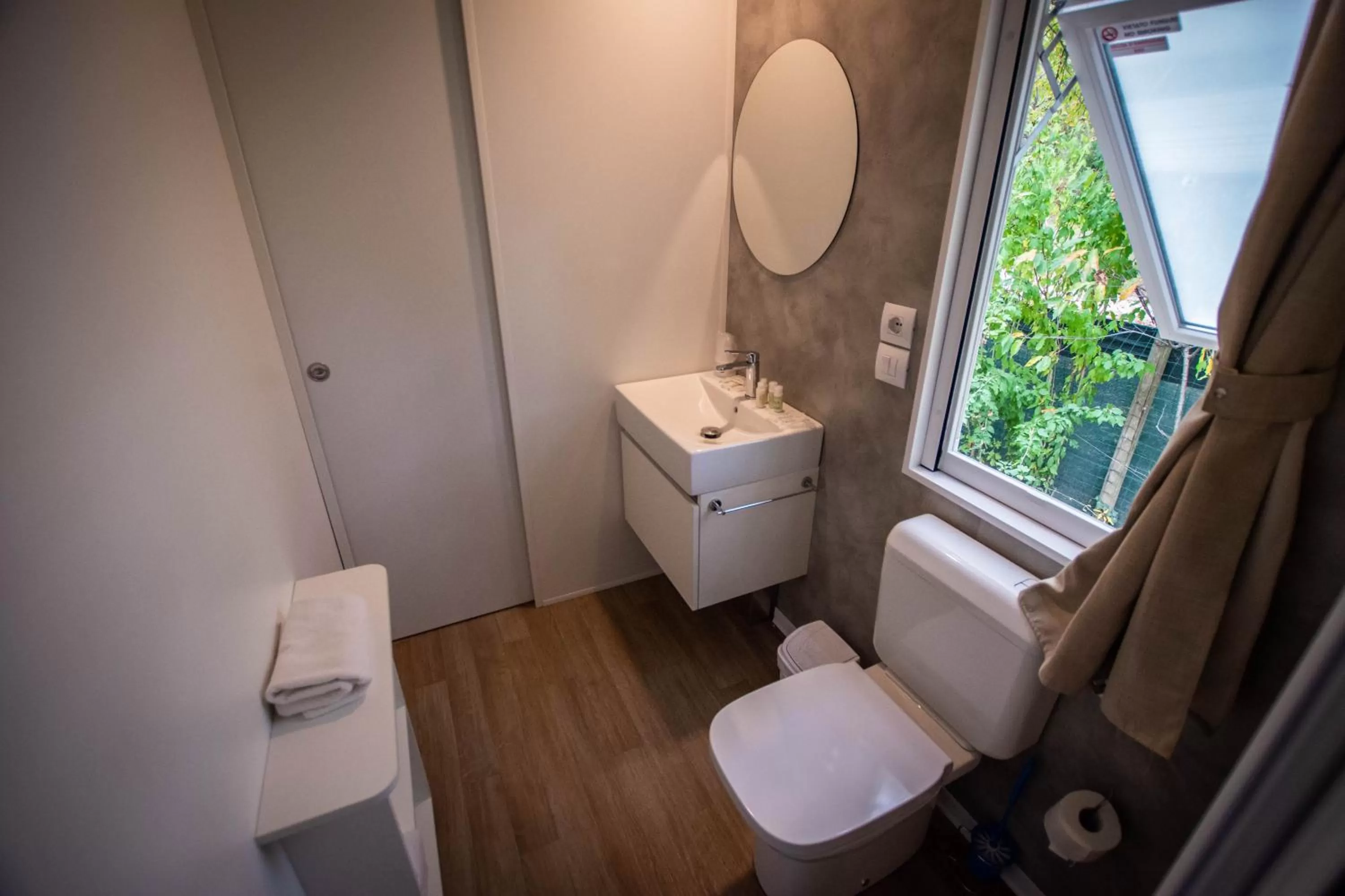 Bathroom in AgriCamping AlbaVillage Hotel & Wellness