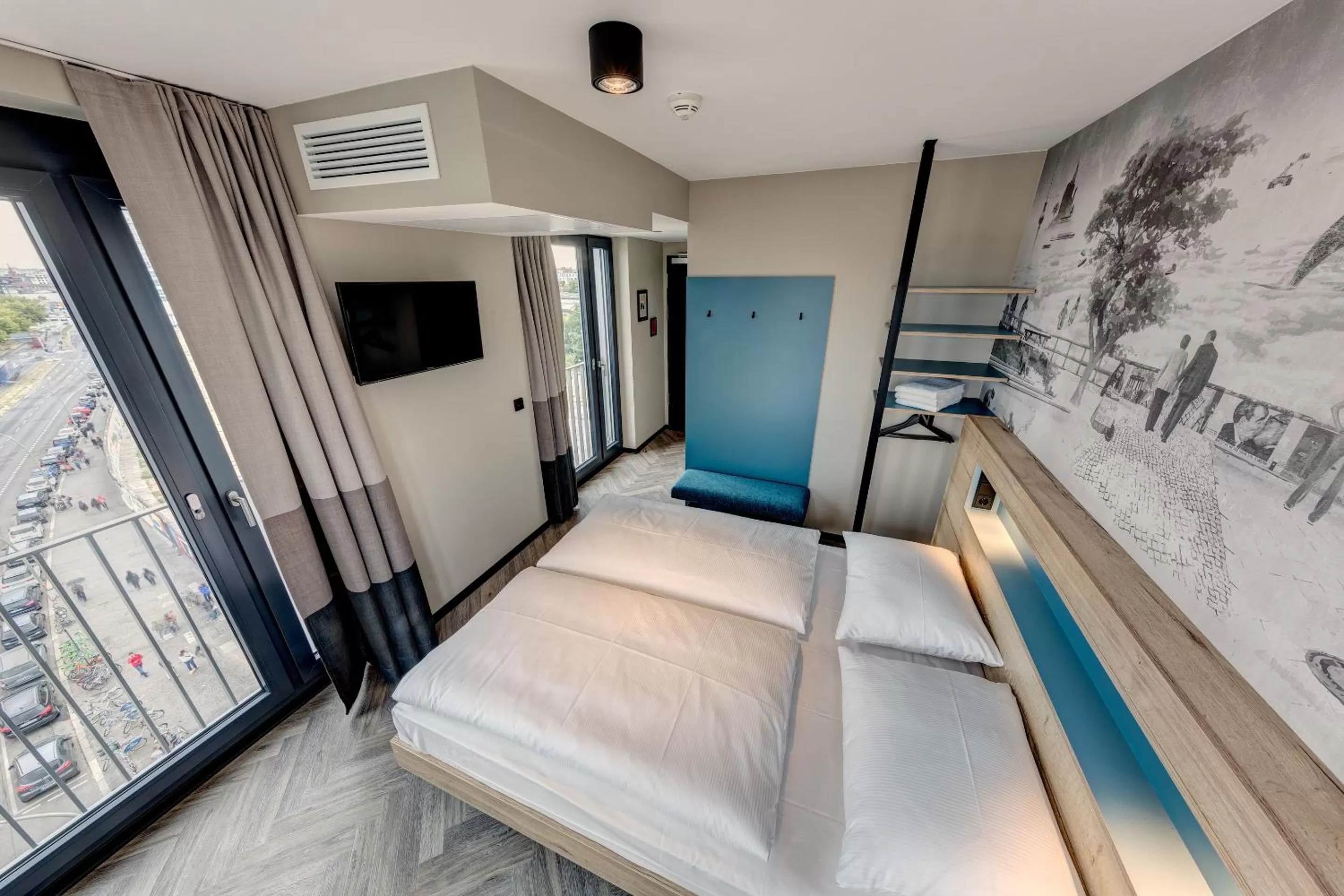 Bed in Schulz Hotel Berlin Wall at the East Side Gallery