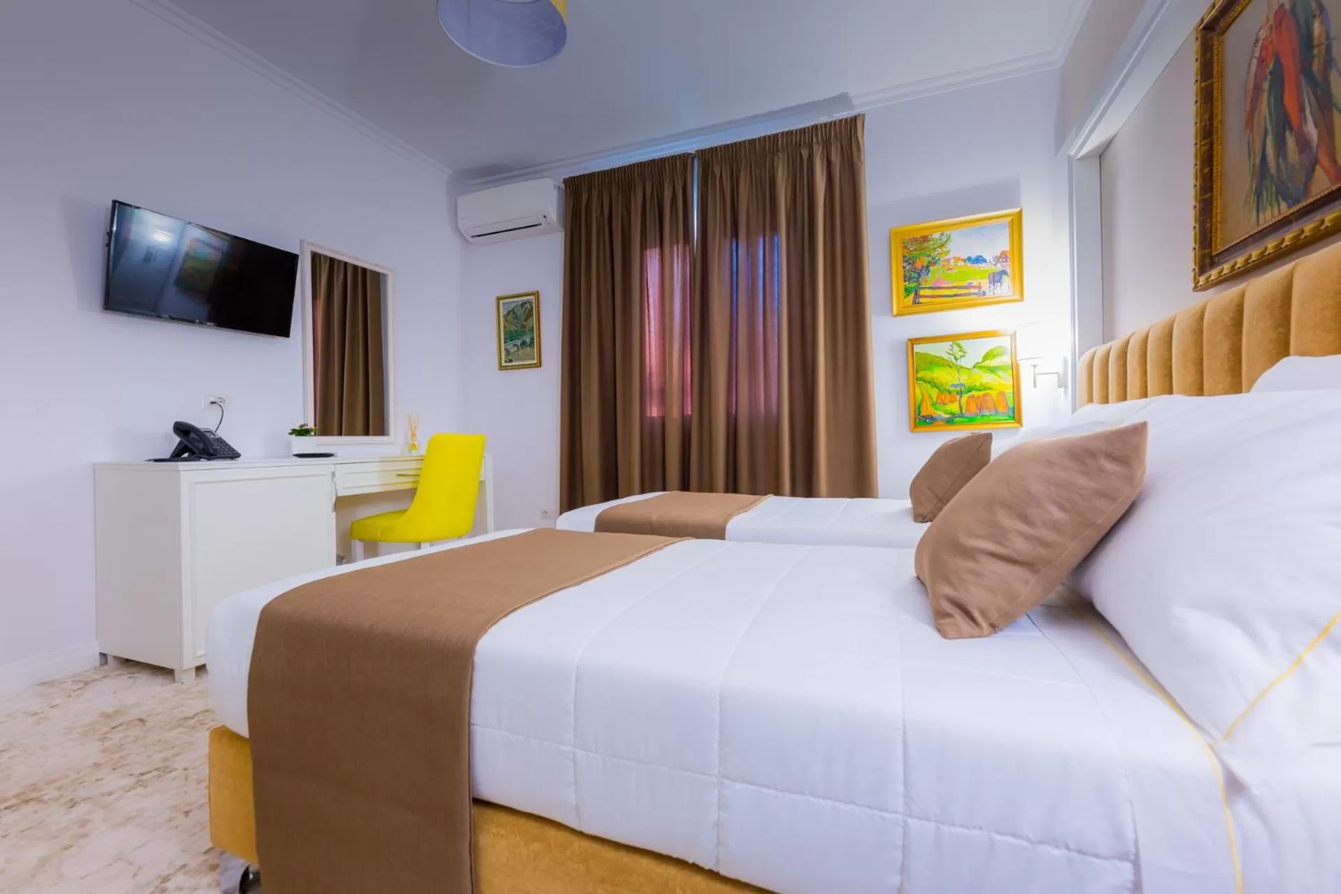 Bed in ART Hotel Tirana