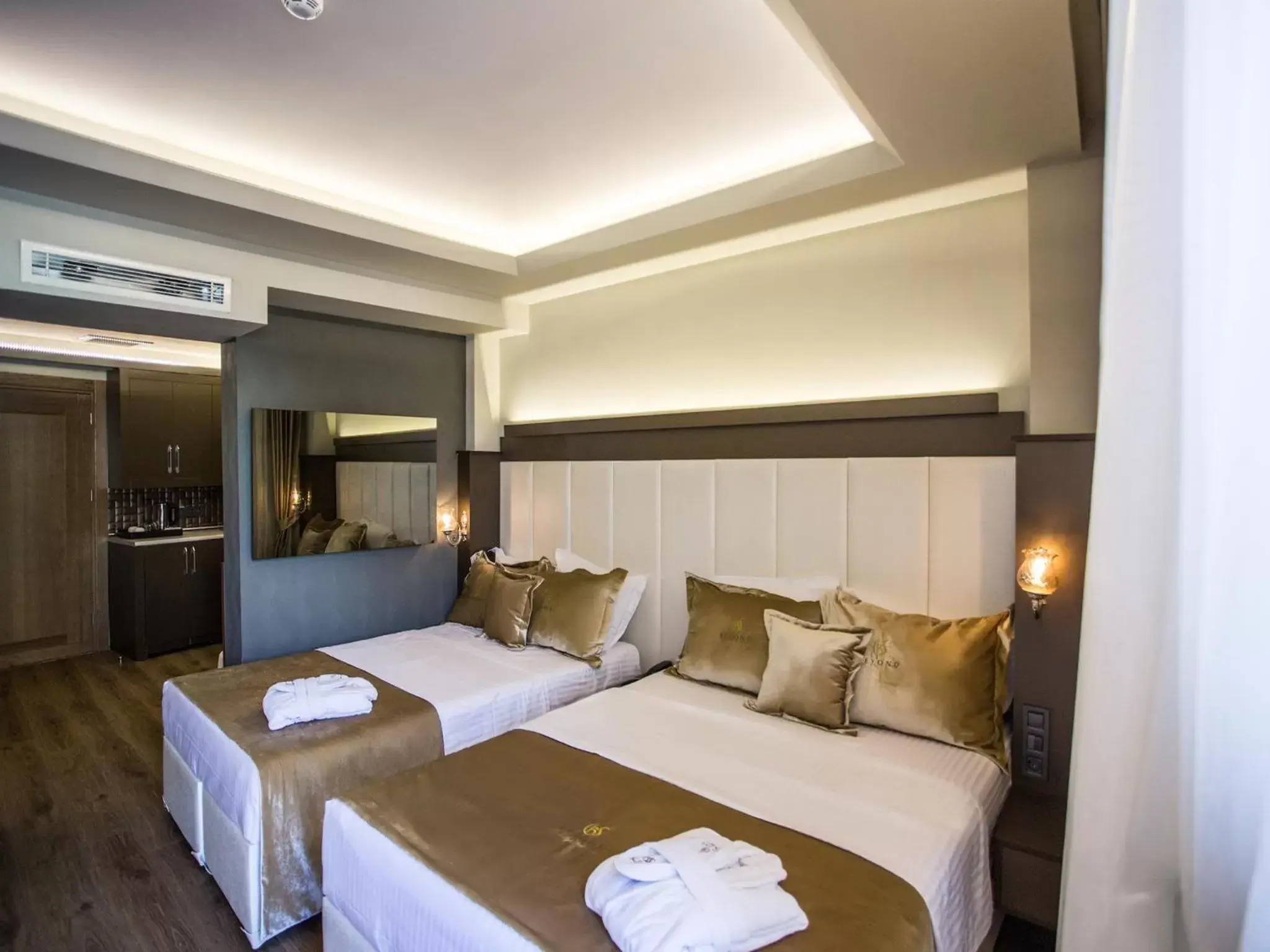 Bed, Room Photo in Bonne Sante Hotel