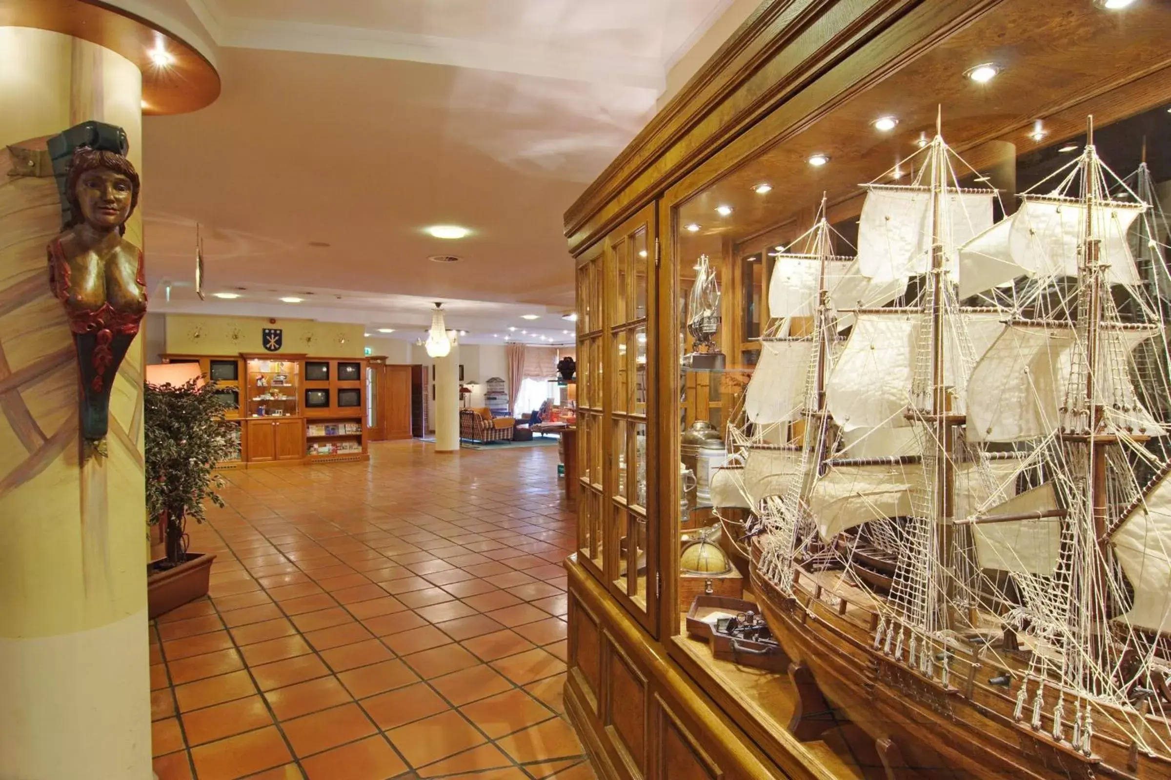 Lobby or reception in Golden Tulip Luebecker Hof