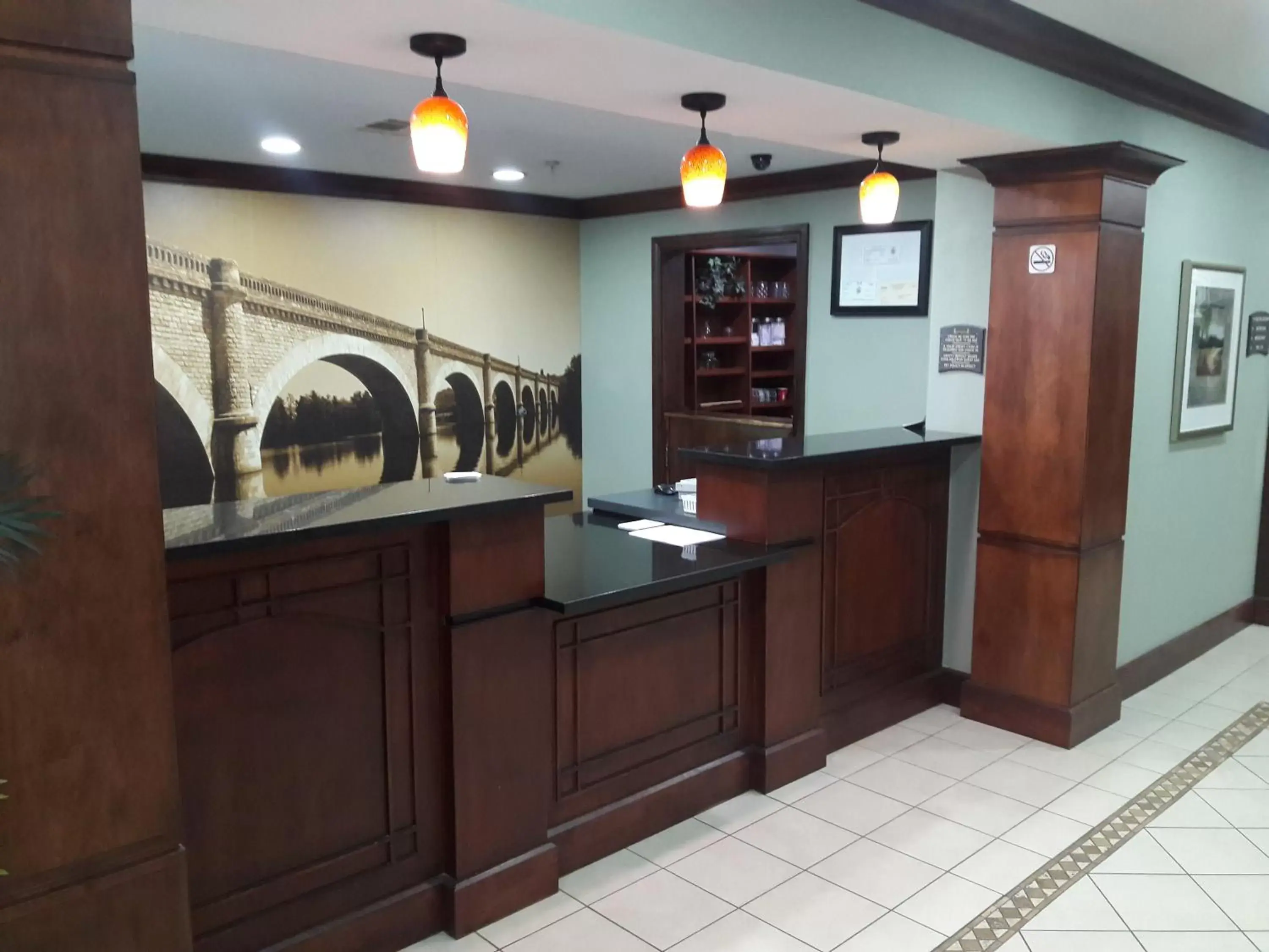 Lobby or reception in WeStay Suites - Covington/Mandeville Lobby or reception in WeStay Suites - Covington/Mandeville