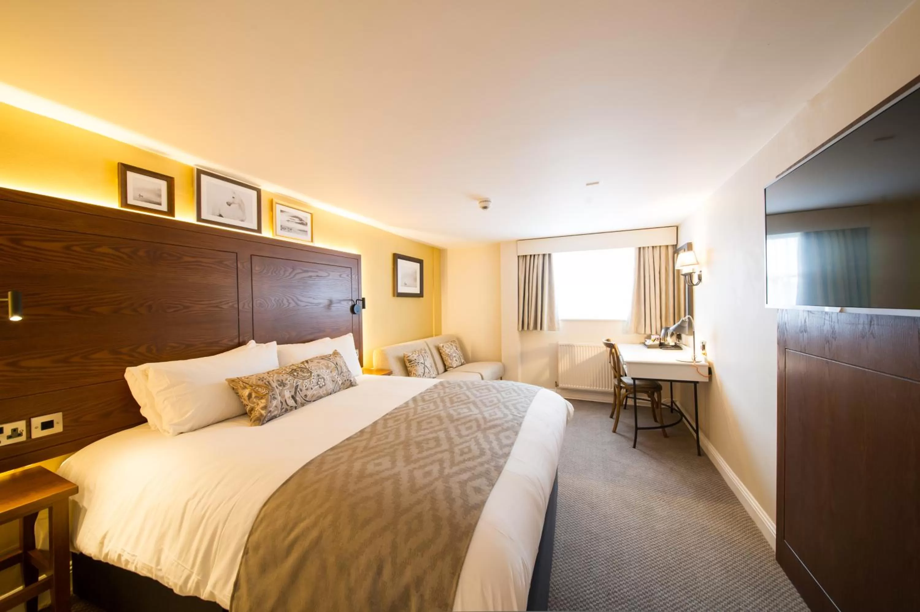 Bed in The Snowy Owl by Innkeeper's Collection