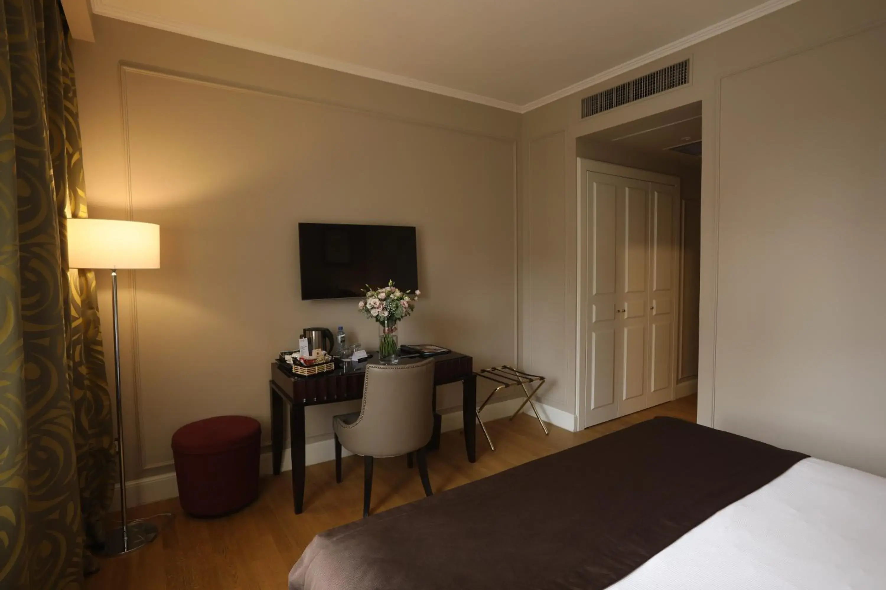 Bed, TV/Entertainment Center in Grand Hotel Yerevan - Small Luxury Hotels of the World