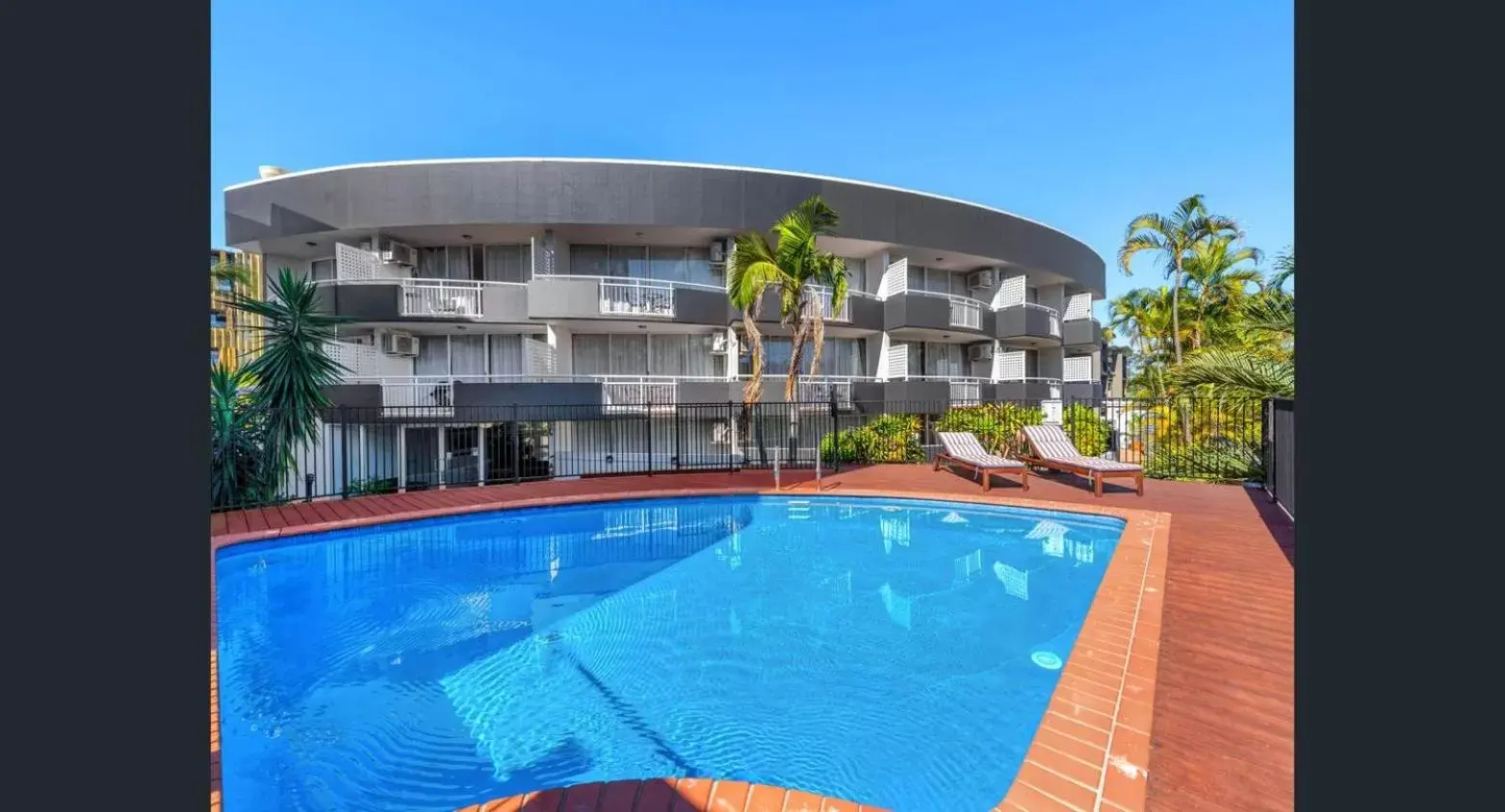 Swimming pool, Property Building in The Wellington Apartment Hotel