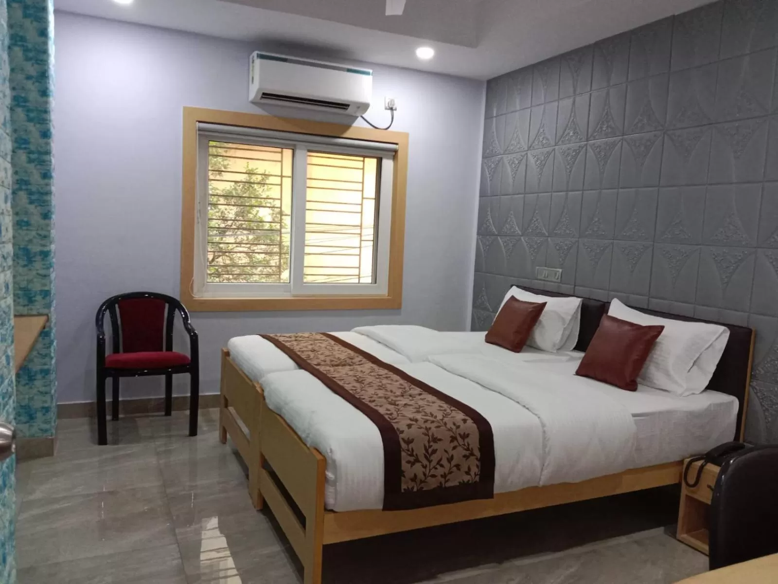 Bed in Soukyam Hotel