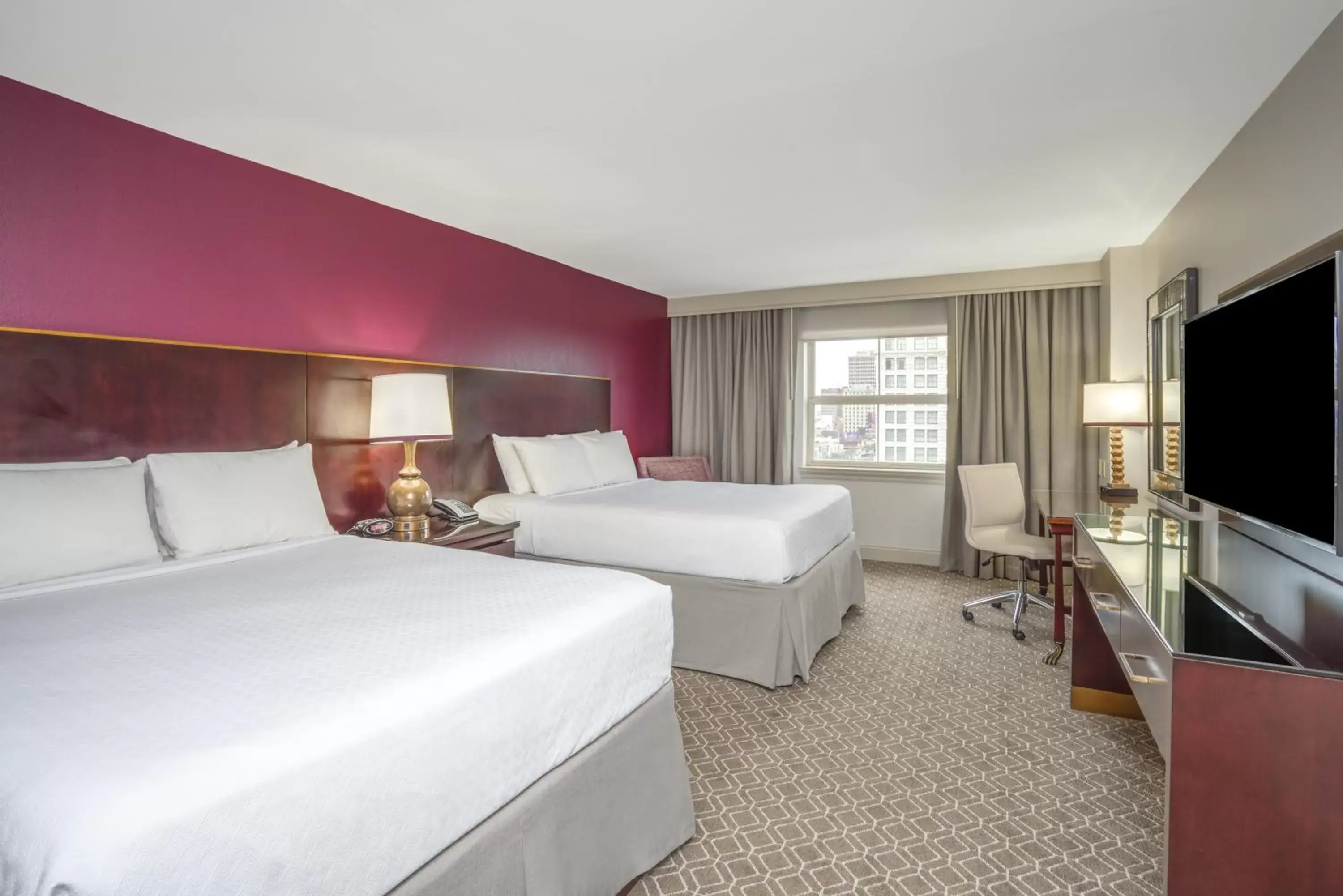 Photo of the whole room, Bed in Astor Crowne Plaza New Orleans French Quarter, Corner of Bourbon and Canal