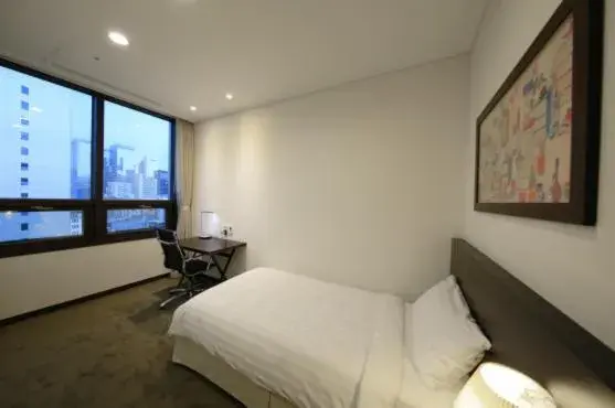 Bed in Orakai Insadong Suites