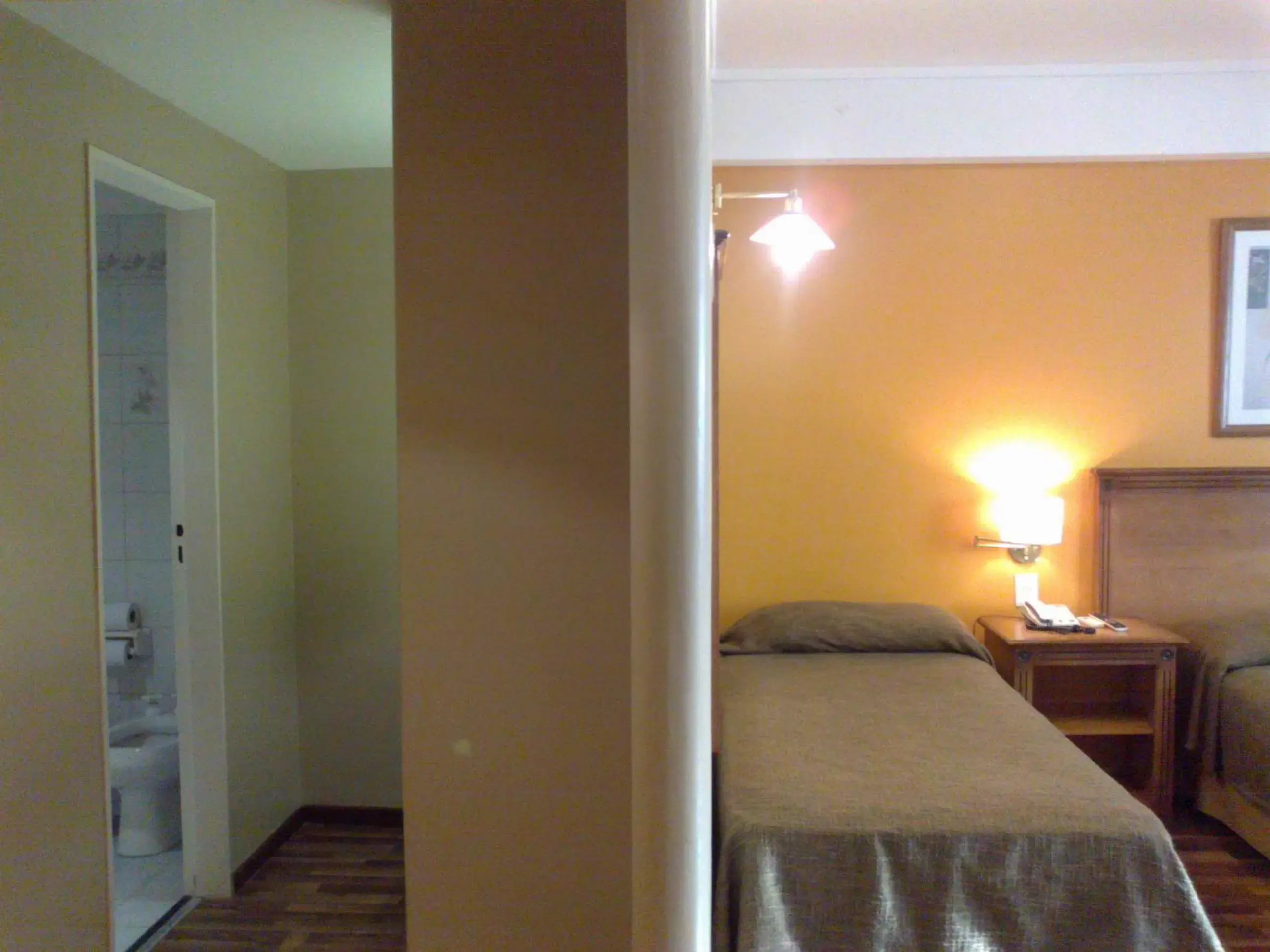 Bedroom, Bed in Tritone Hotel