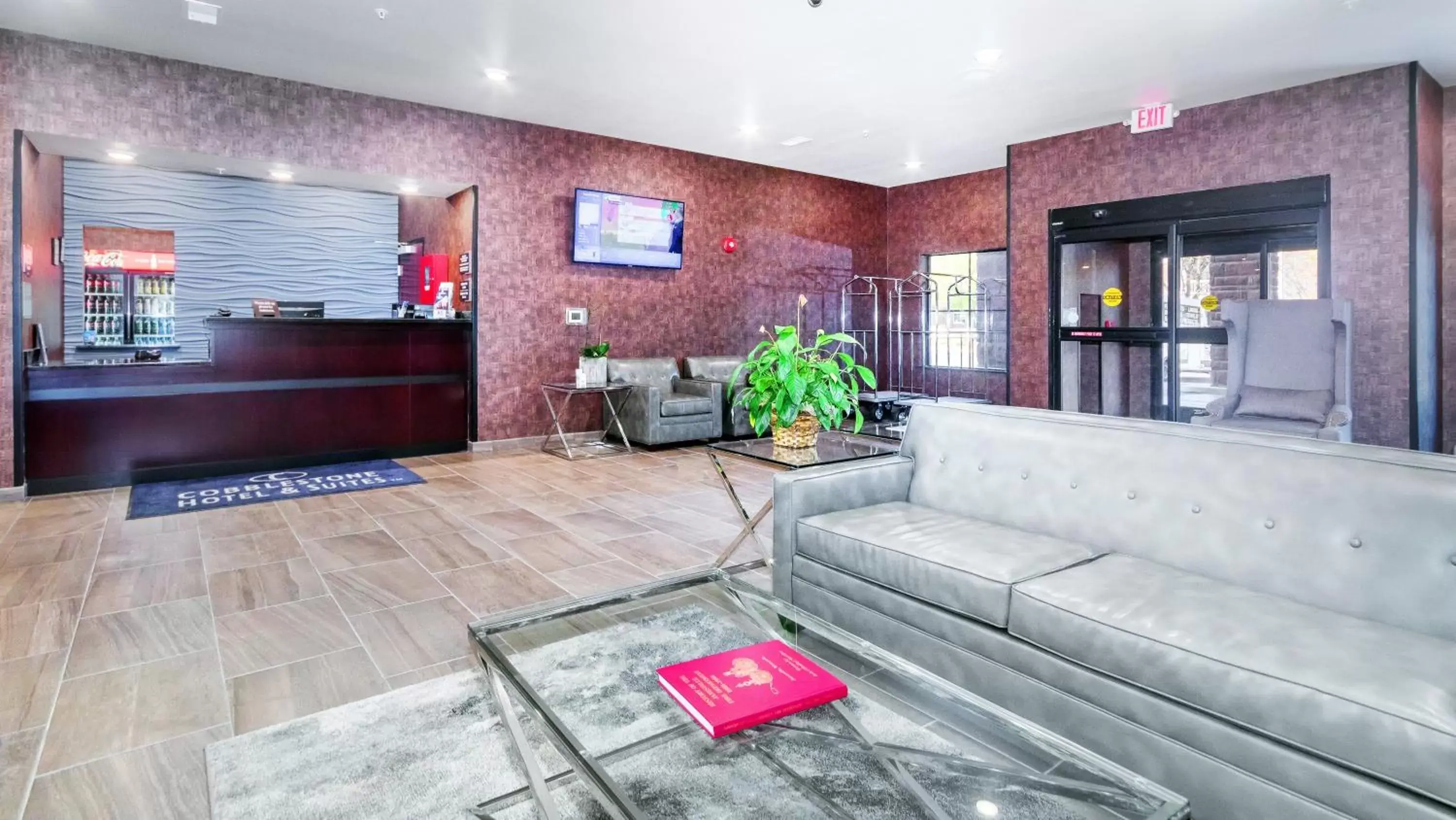 Lobby or reception in Cobblestone Hotel & Suites - Janesville Lobby or reception in Cobblestone Hotel & Suites - Janesville