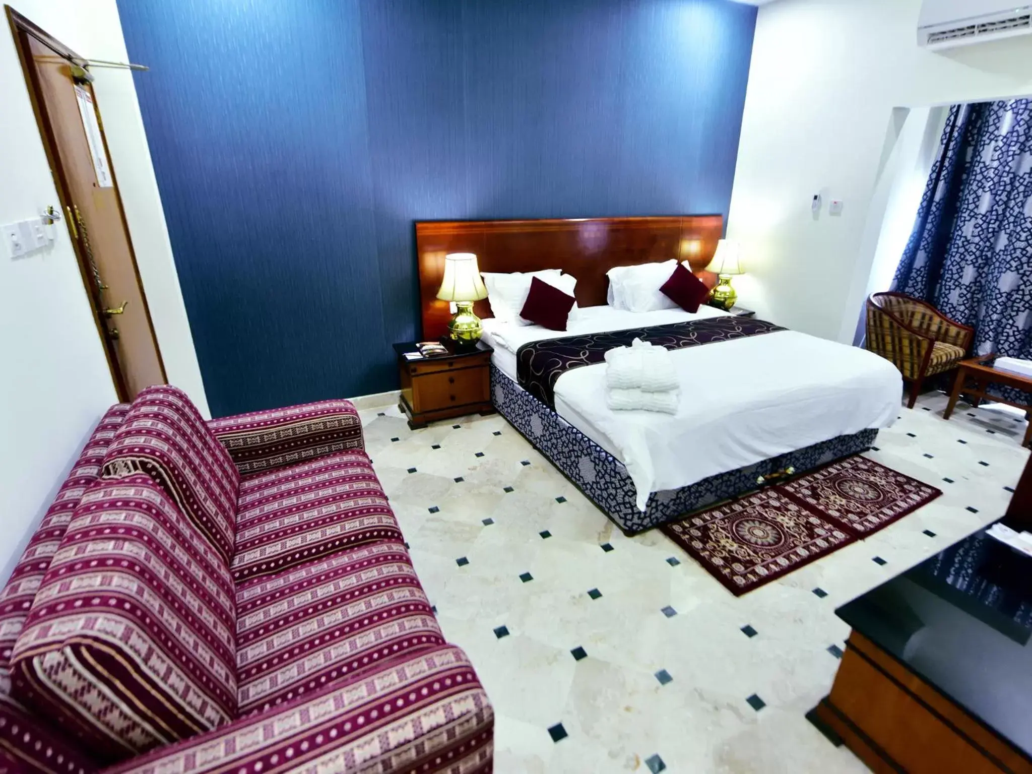 Photo of the whole room, Bed in Al Bahjah Hotel