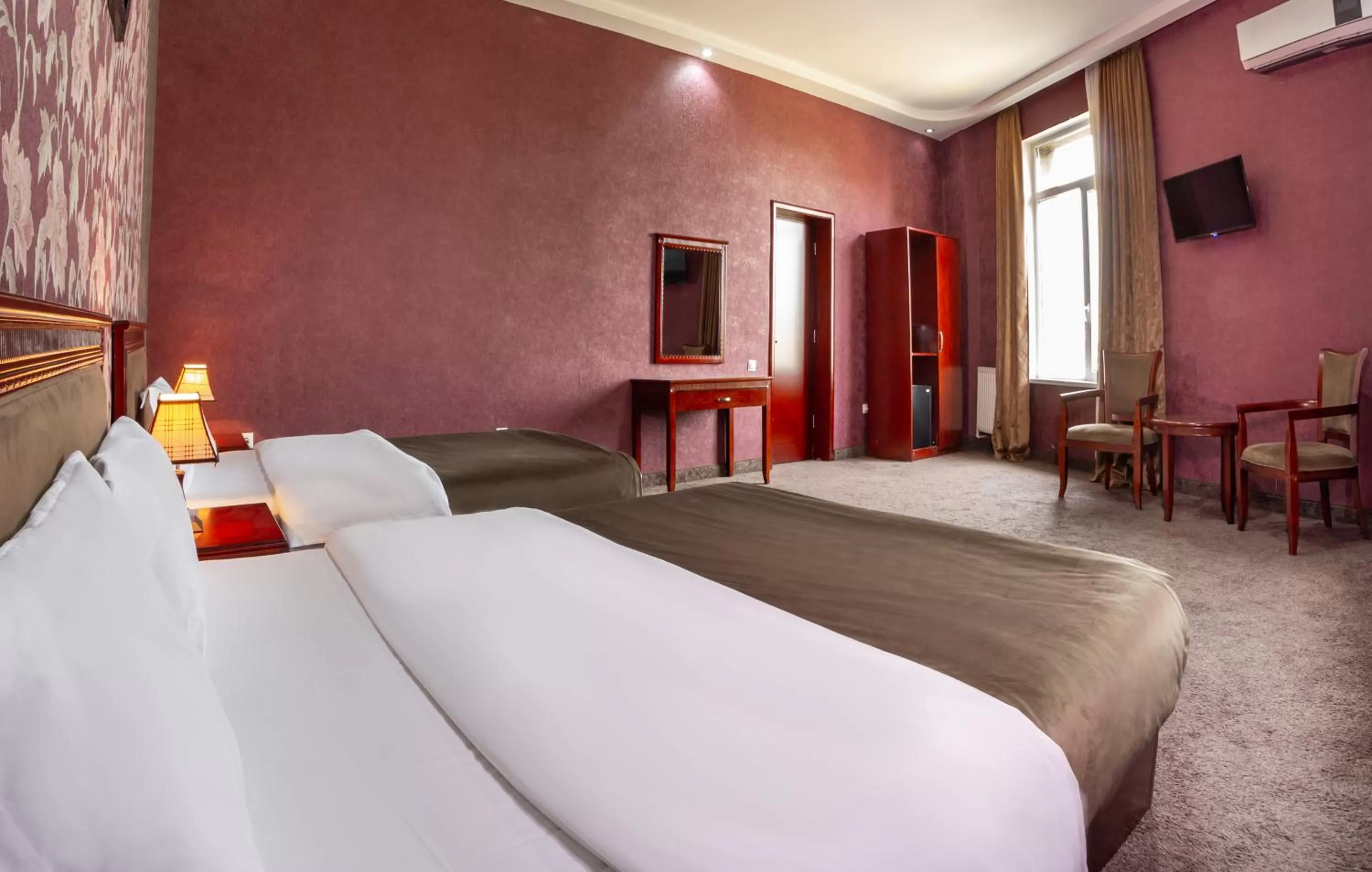 Communal lounge/ TV room, Bed in Margo Palace Hotel