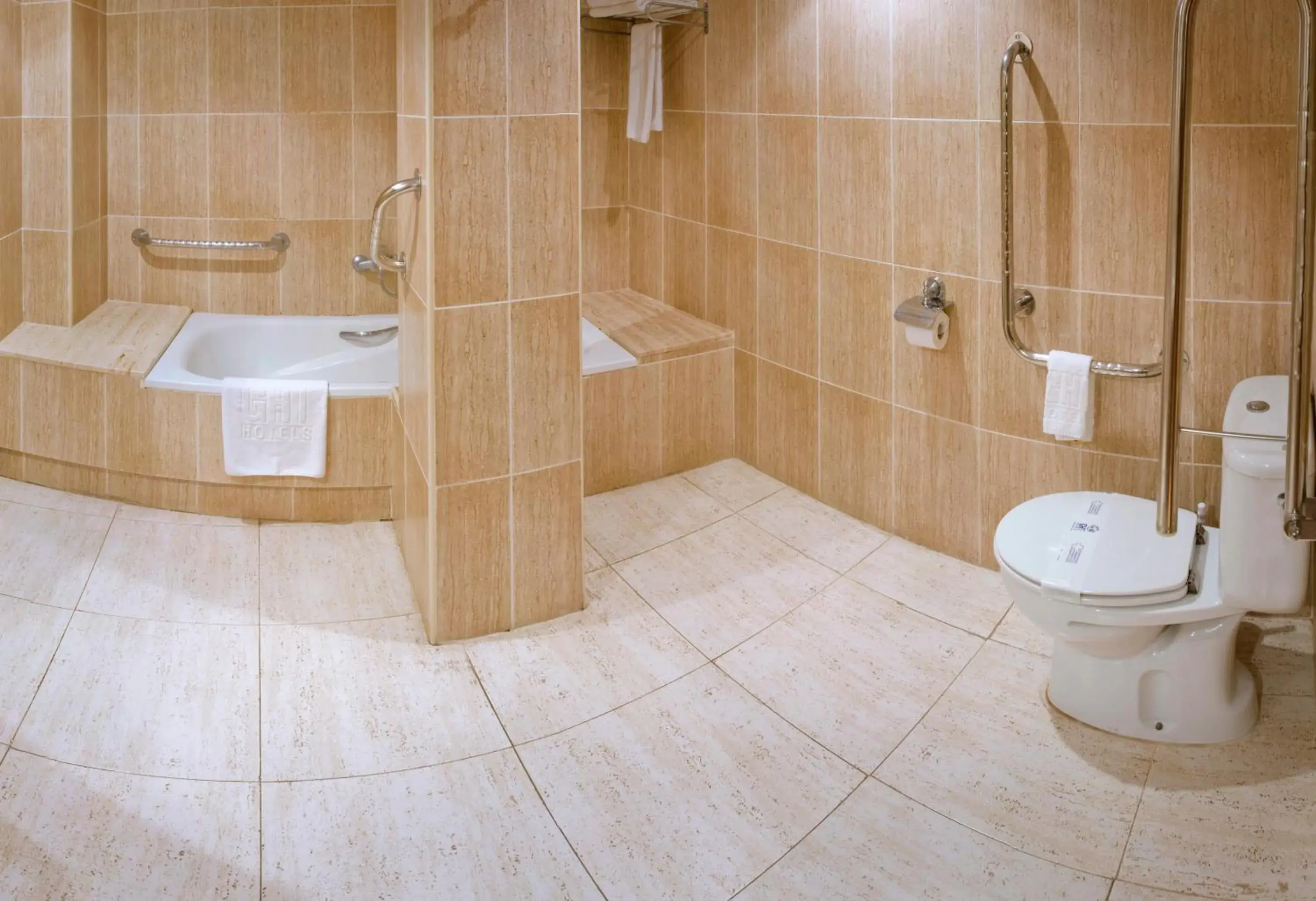 Bathroom in Hotel GHT Neptuno-Tossa & Venus SPA Bathroom in Hotel GHT Neptuno-Tossa & Venus SPA