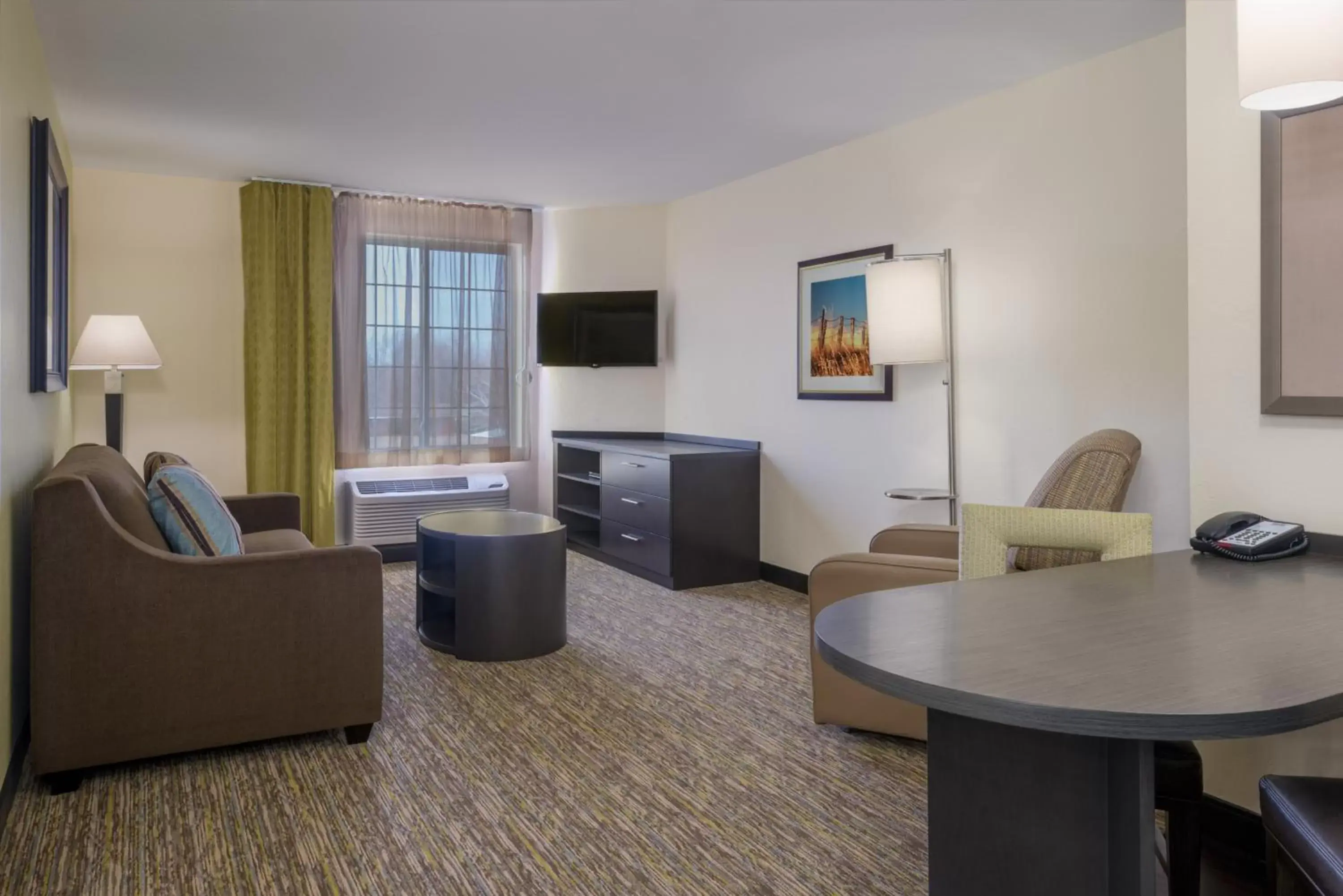 Bedroom, Seating Area in Candlewood Suites Del City, an IHG Hotel