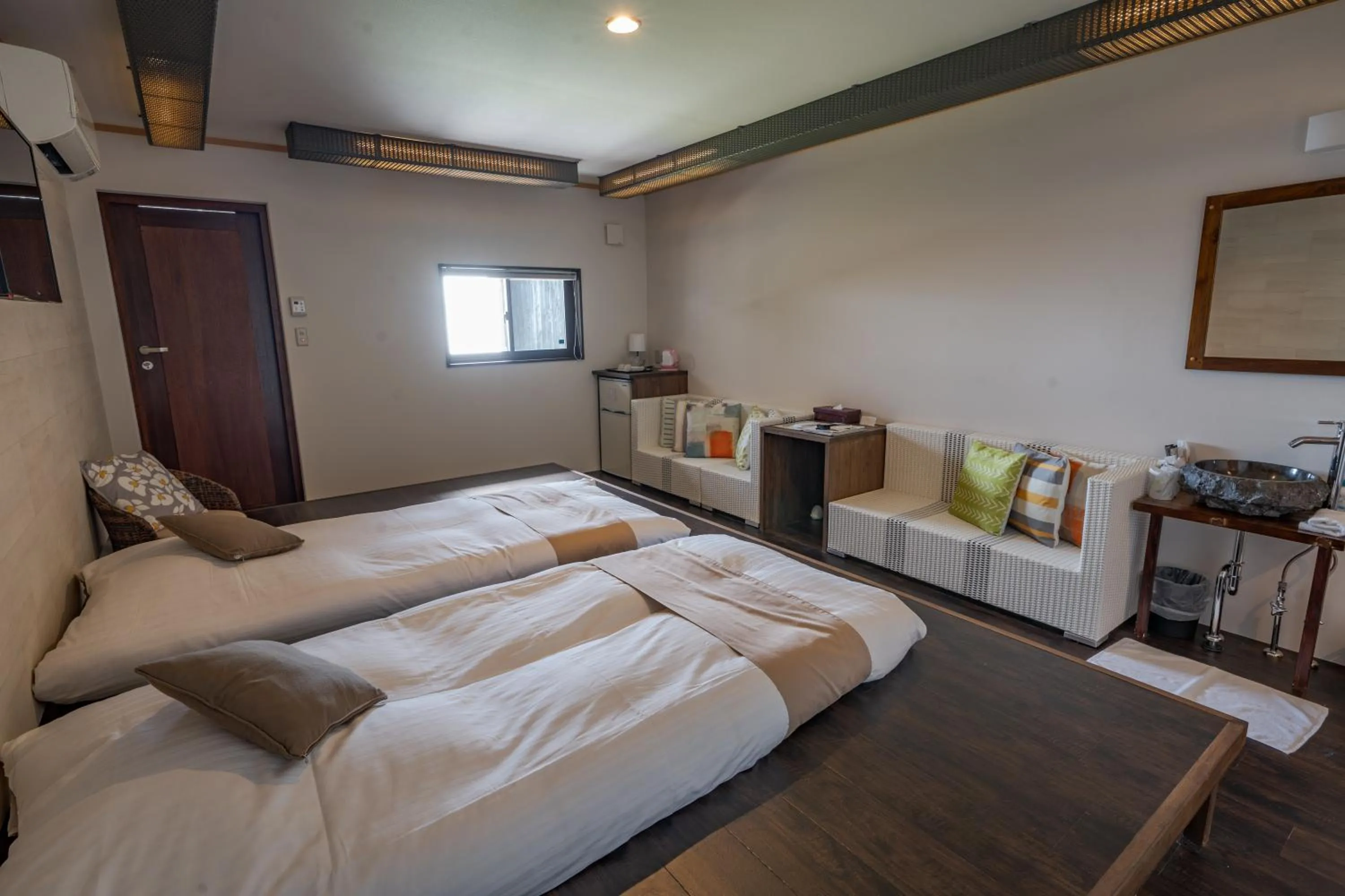 Bed in XYZ Private Spa and Seaside Resort