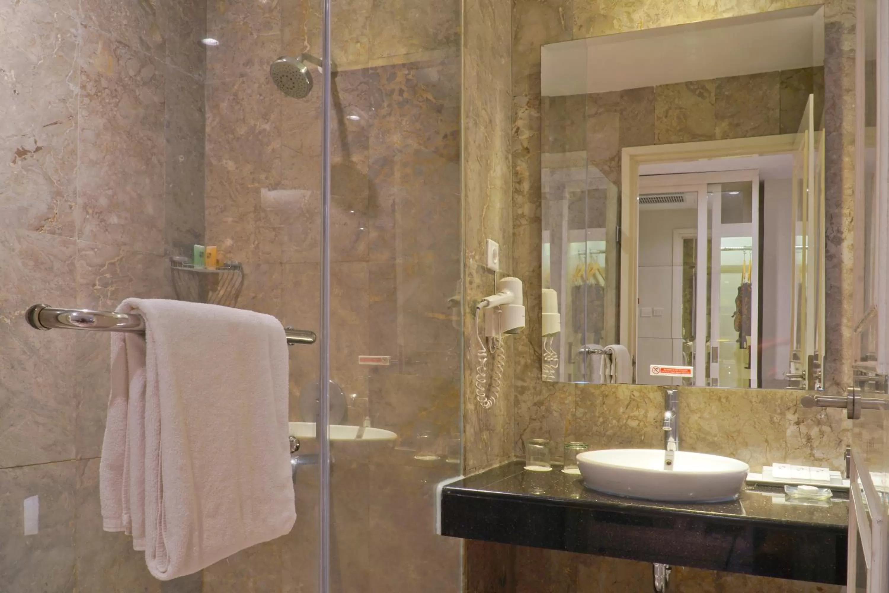 Bedroom in Swiss-Belhotel Lampung