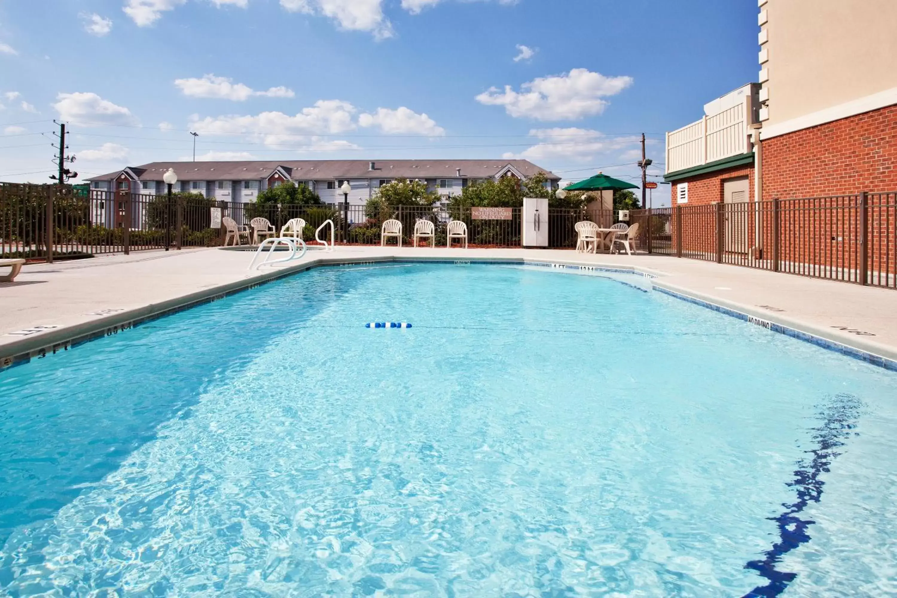 Patio, Swimming Pool in Country Inn & Suites by Radisson, Tifton, GA