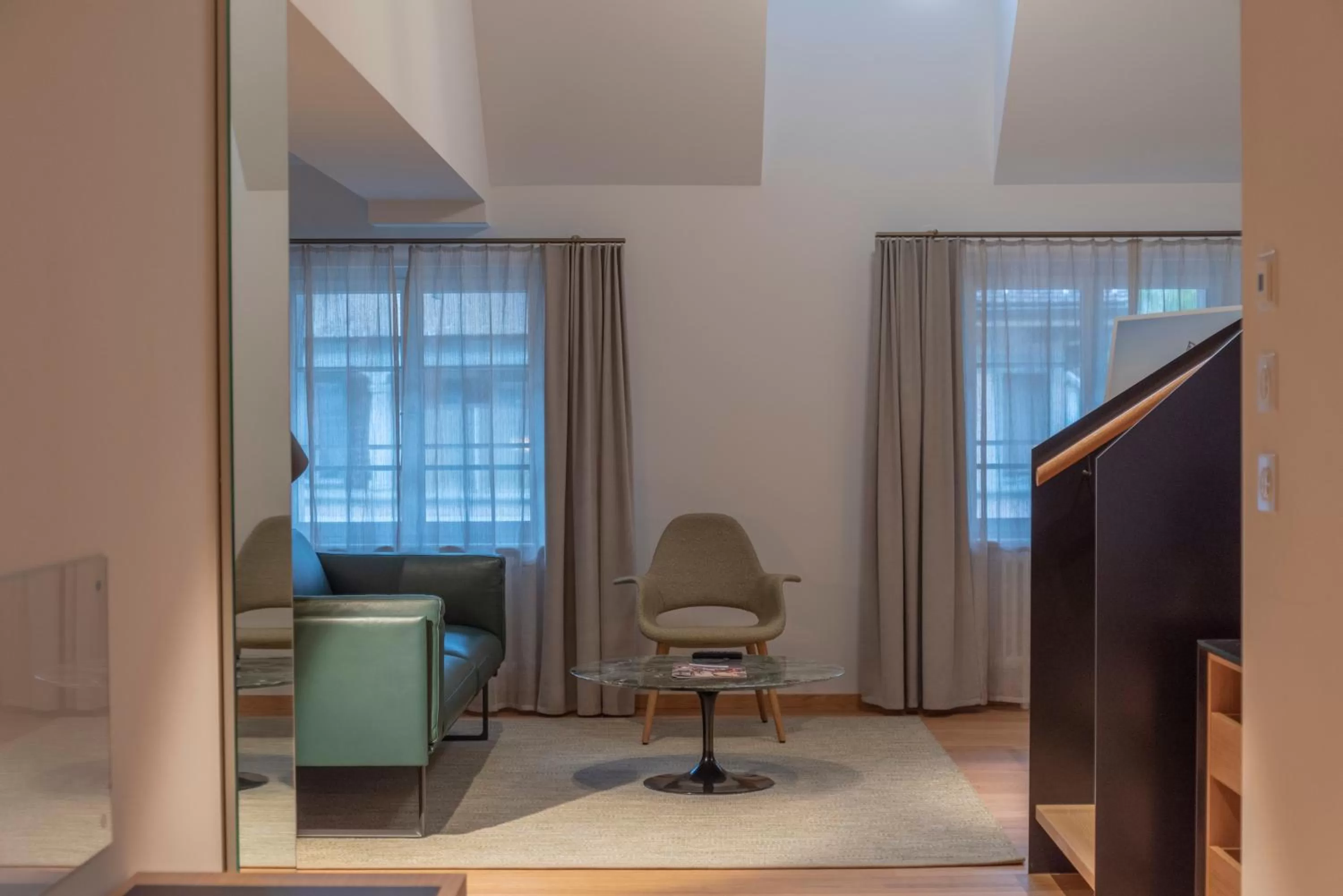 Living room in CASPAR Swiss Quality Hotel