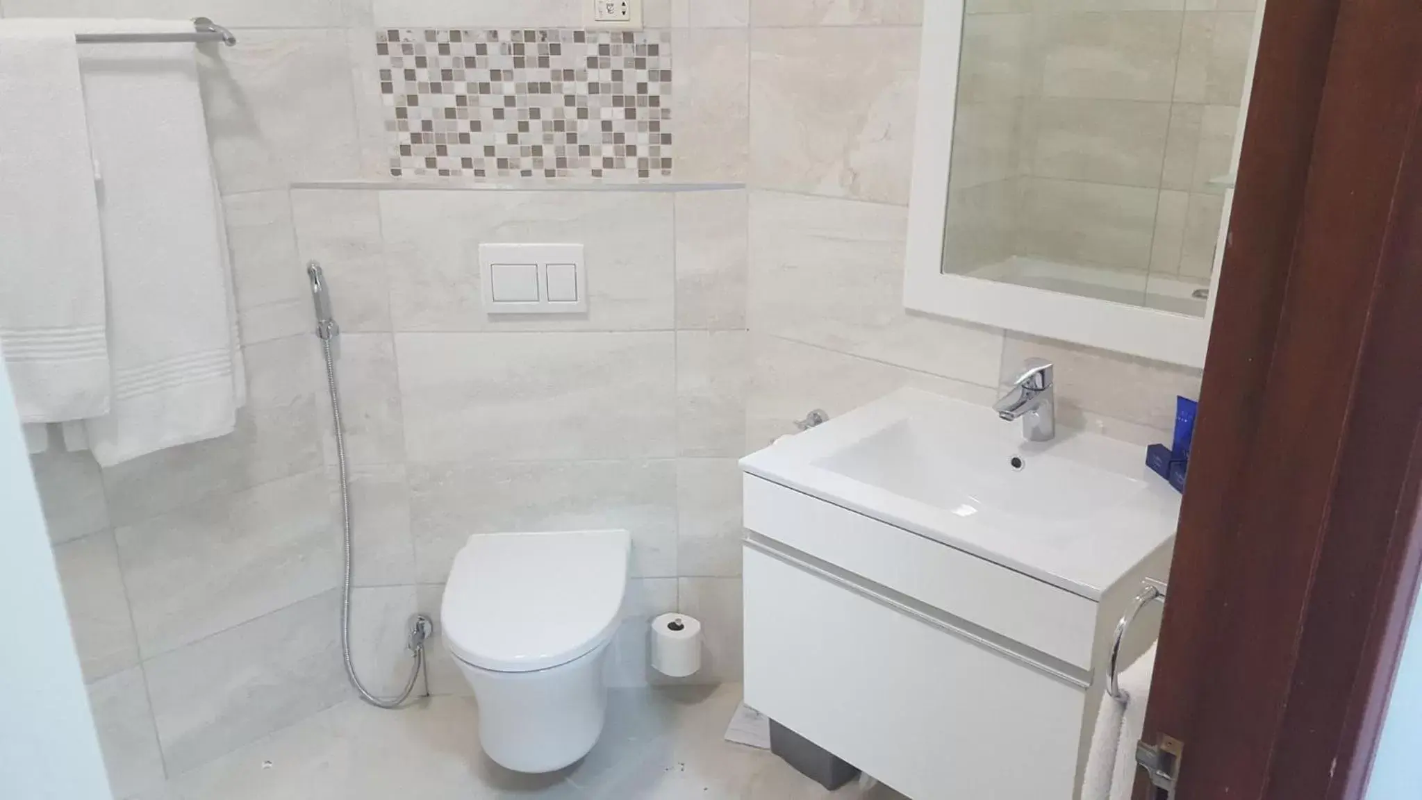 Bathroom in The Point Hotel & Spa Bathroom in The Point Hotel & Spa