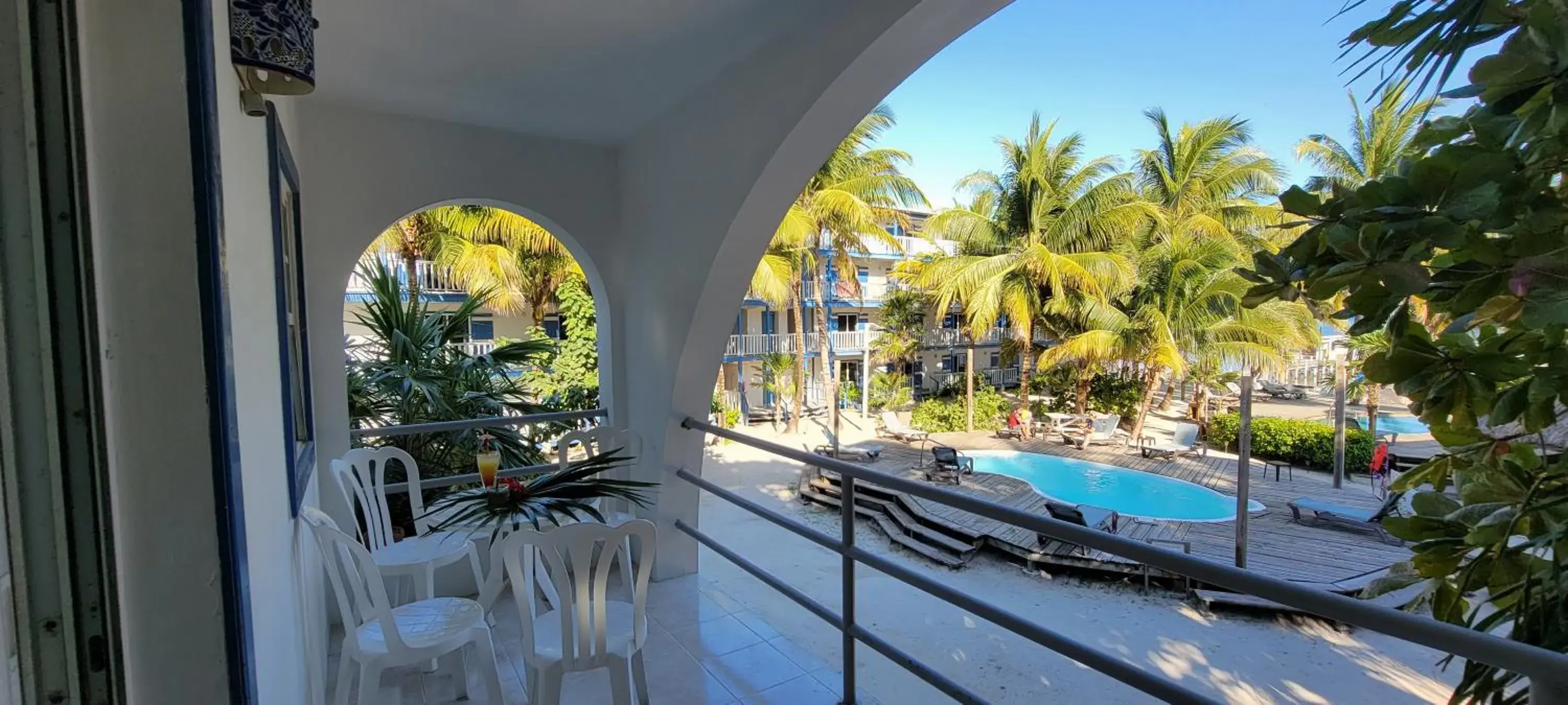 Balcony/Terrace, Pool View in Caribbean Villas Hotel