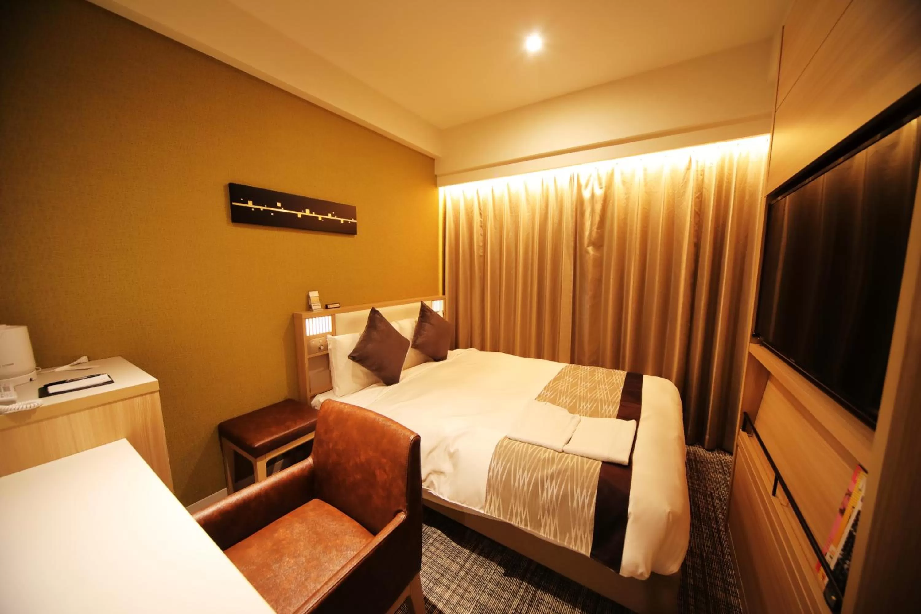 Bed in Hotel Sunroute Asakusa