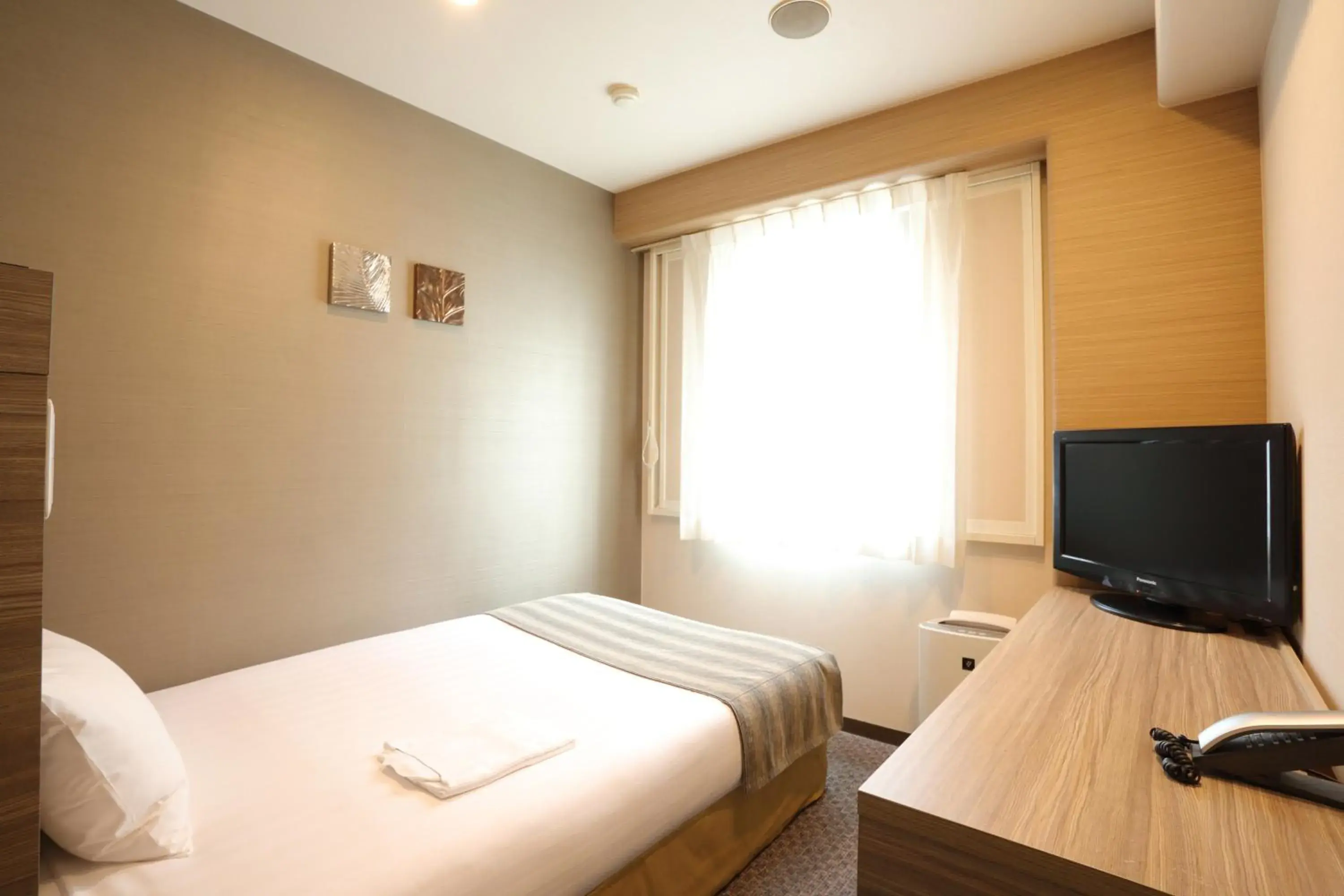 Photo of the whole room, Bed in Smile Hotel Kawaguchi