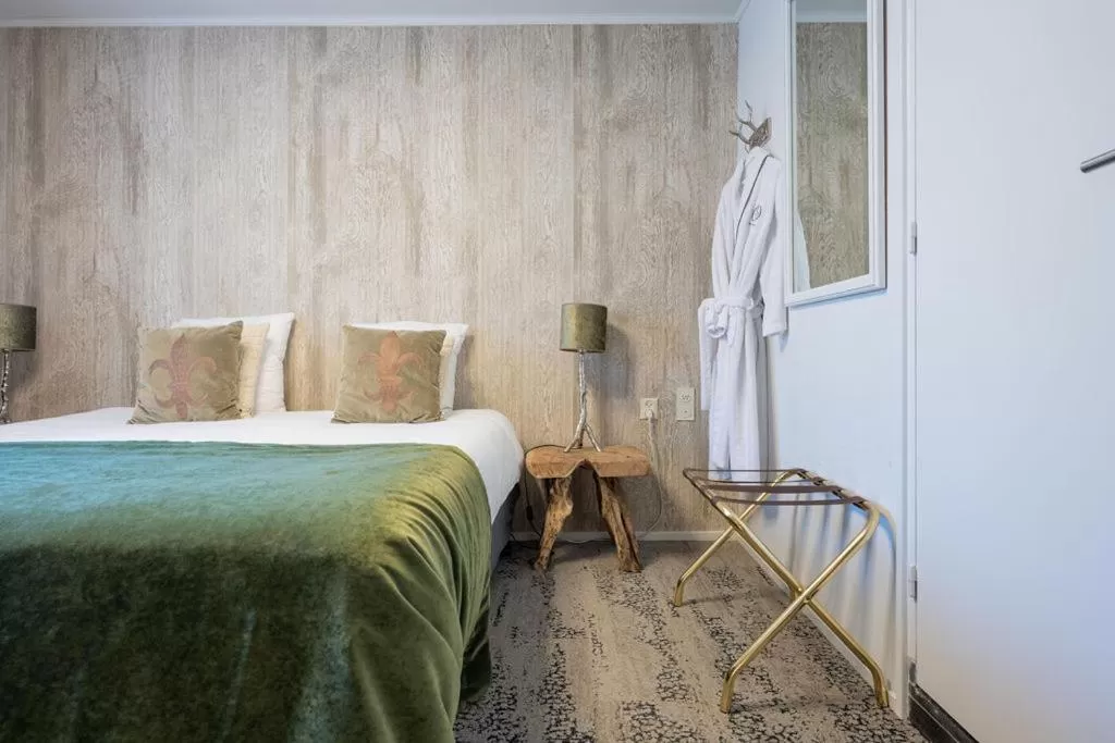 Bed in Boutique Hotel Slenaker Vallei - Buitengewoongenieten