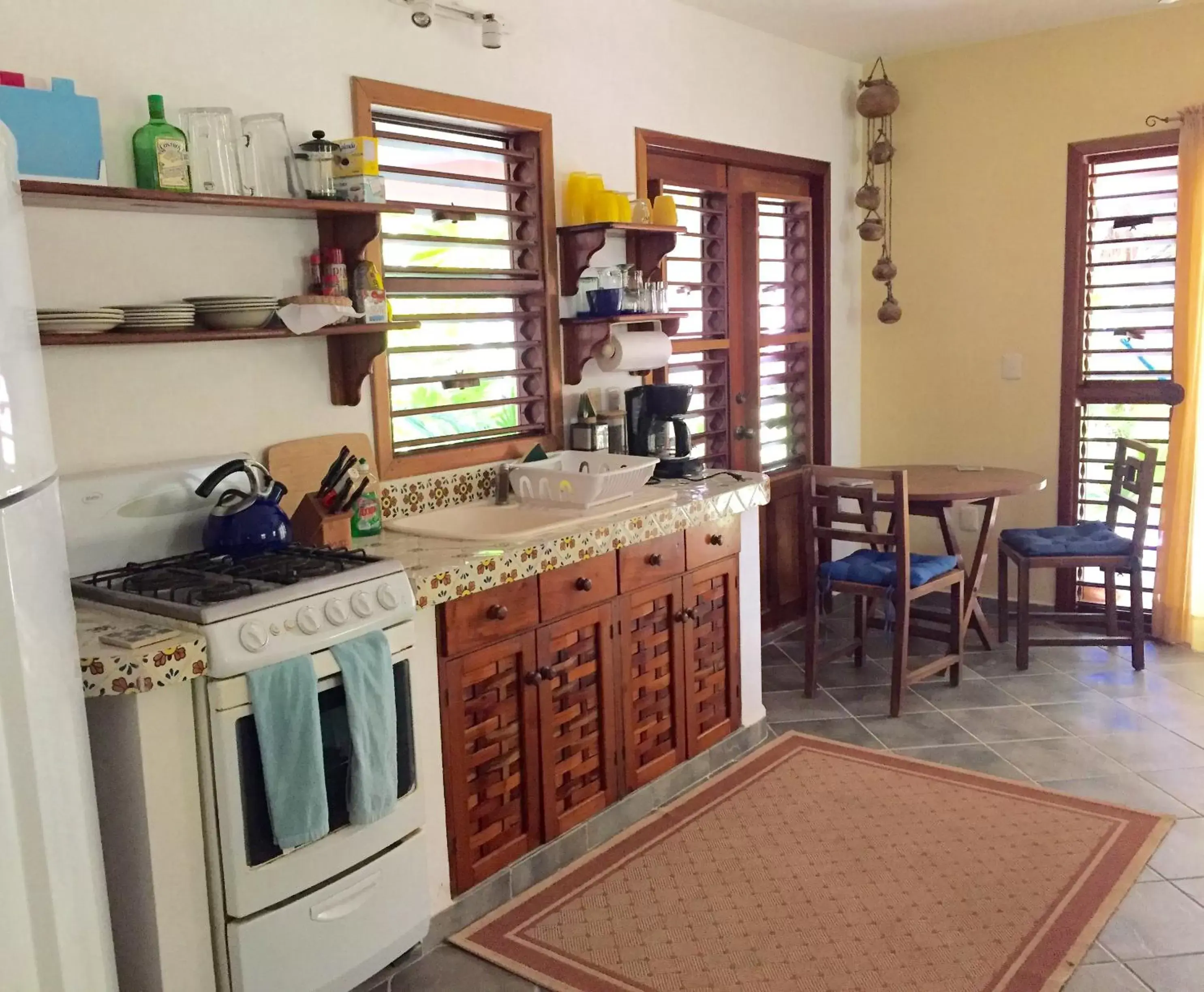 Kitchen/Kitchenette in Nah Uxibal Villa and Casitas