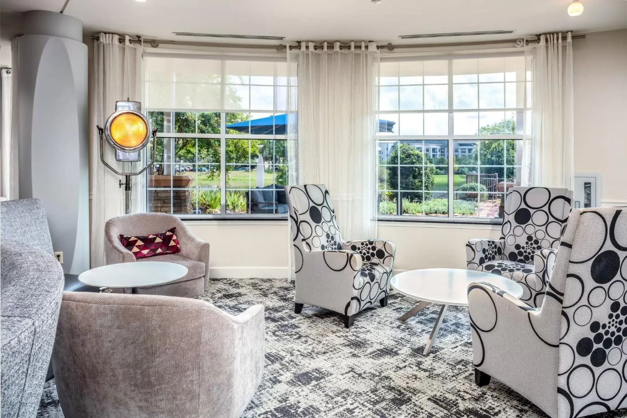 Property building, Seating Area in Hotel Indigo Jacksonville-Deerwood Park, an IHG Hotel