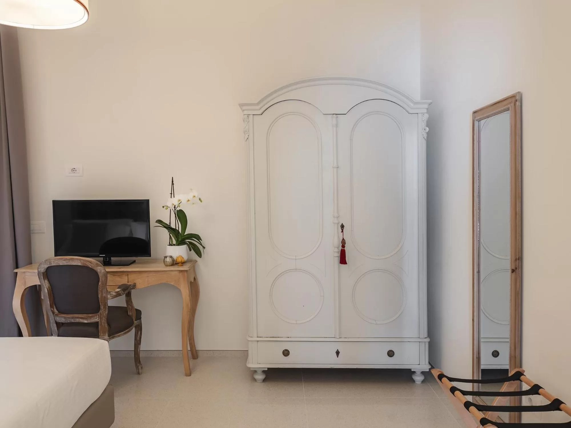 Bedroom in Living u HomeSuites