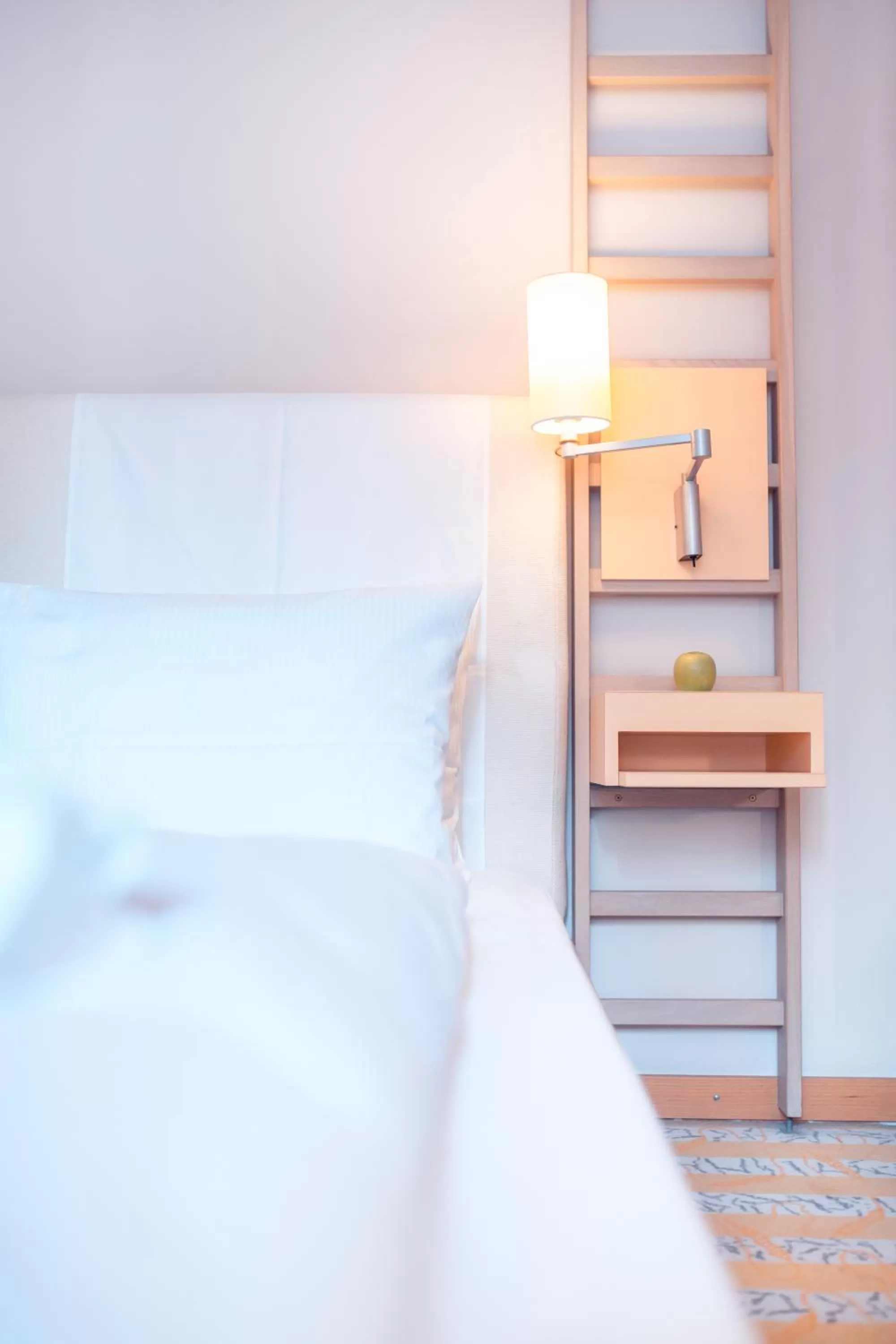 Bed in Hotel Bleibtreu Berlin by Golden Tulip