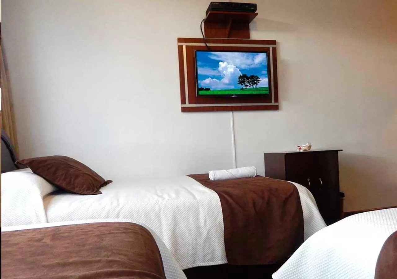 Photo of the whole room, Bed in La Merced Plaza Hospedaje