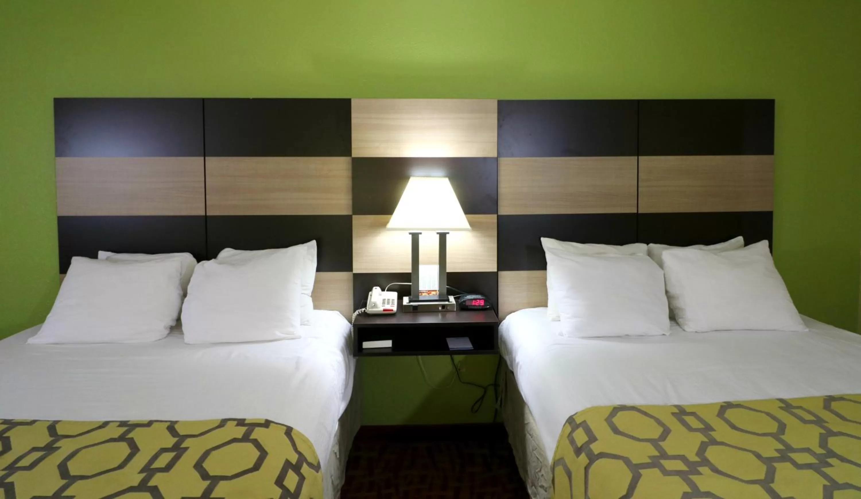 Decorative detail, Bed in Baymont by Wyndham Sevierville Pigeon Forge