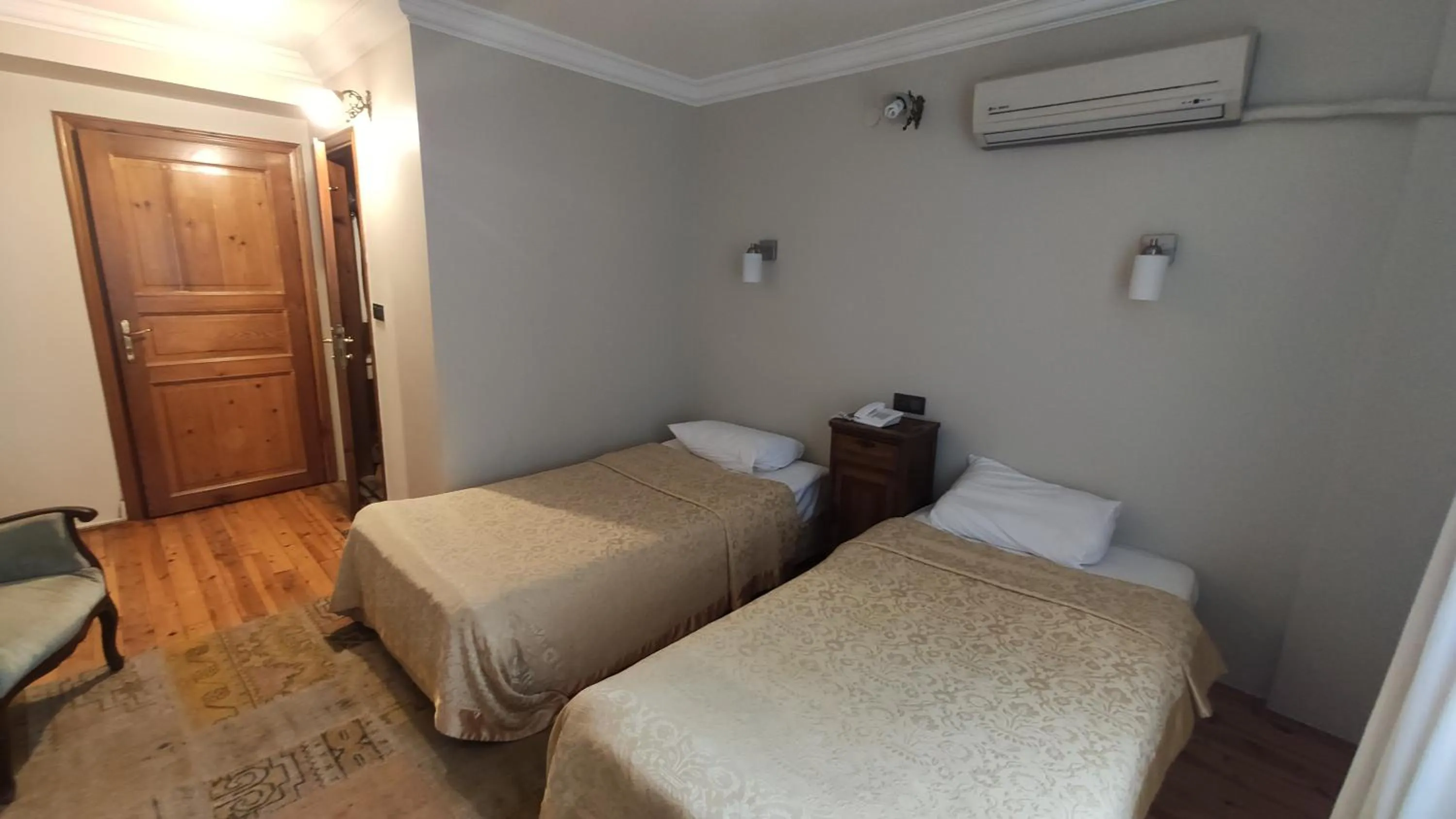 Bed in Turkoman Hotel