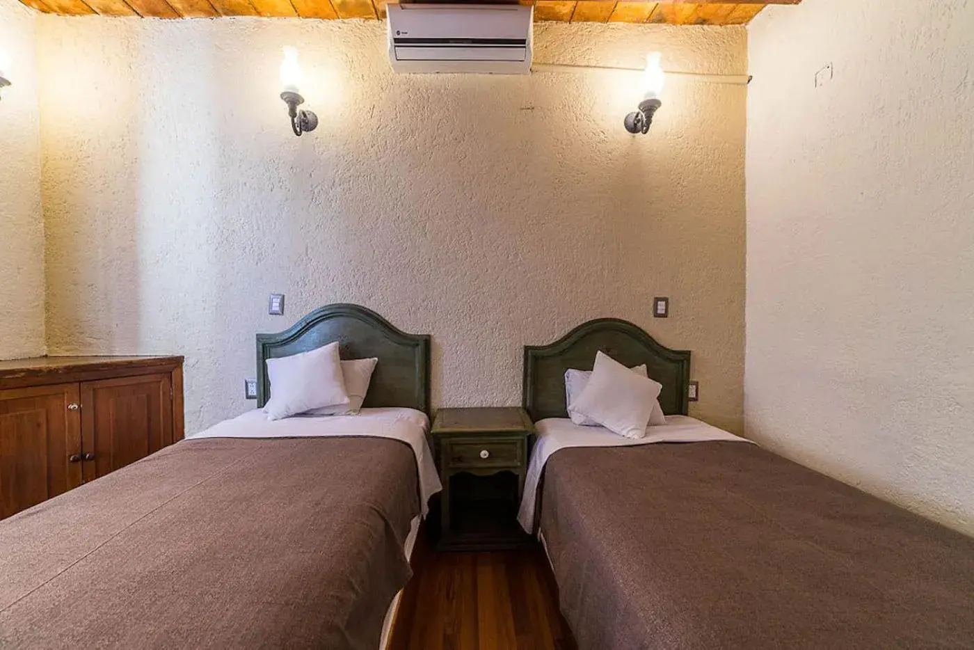 Bed in Meson De La Merced Hotel & Suites