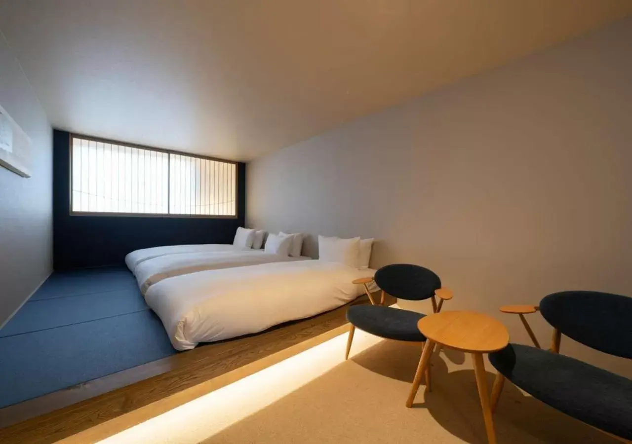 Living room, Bed in HOTEL WOOD TAKAYAMA