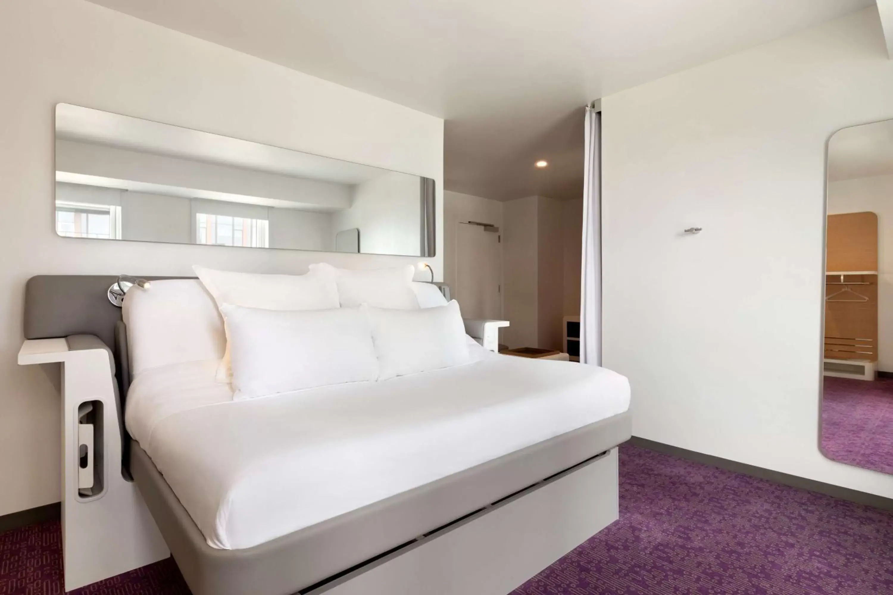 Photo of the whole room, Bed in YOTEL Boston