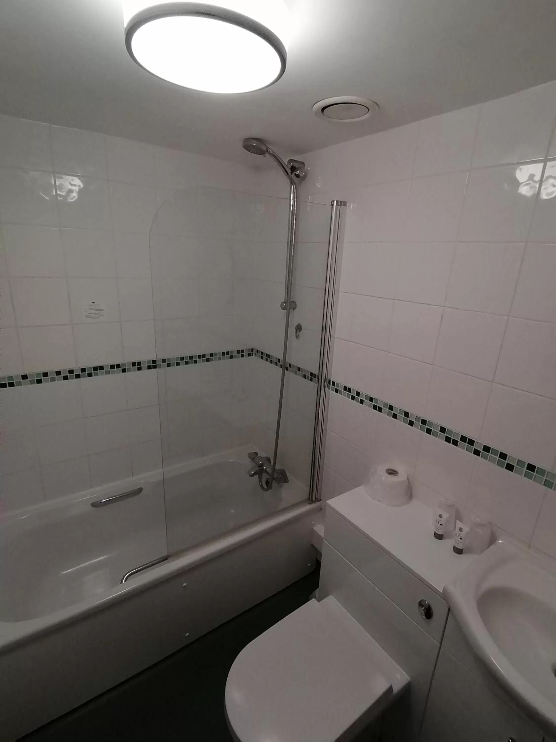 Toilet in North Shore Hotel