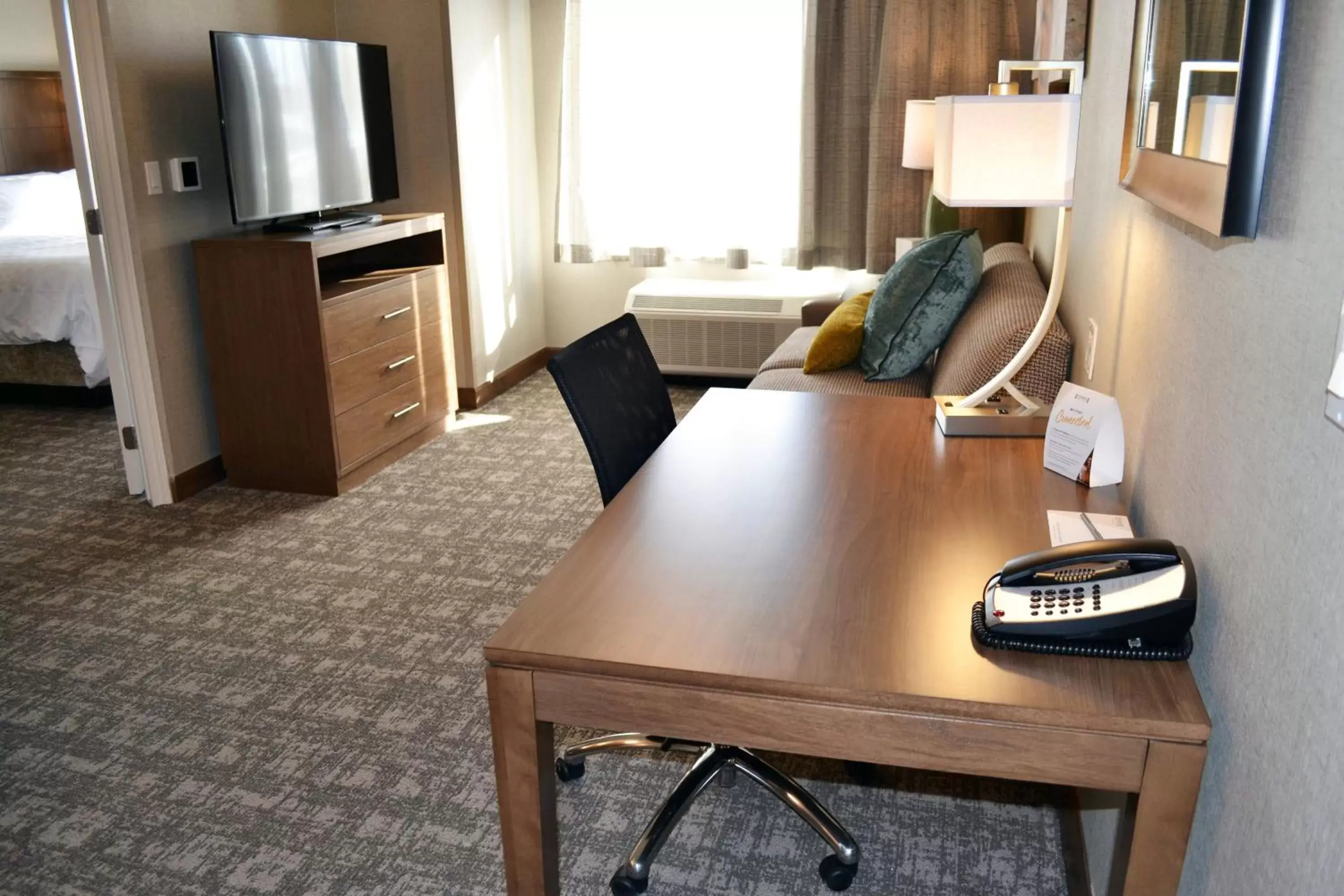 Photo of the whole room, TV/Entertainment Center in Staybridge Suites - Red Deer North, an IHG Hotel