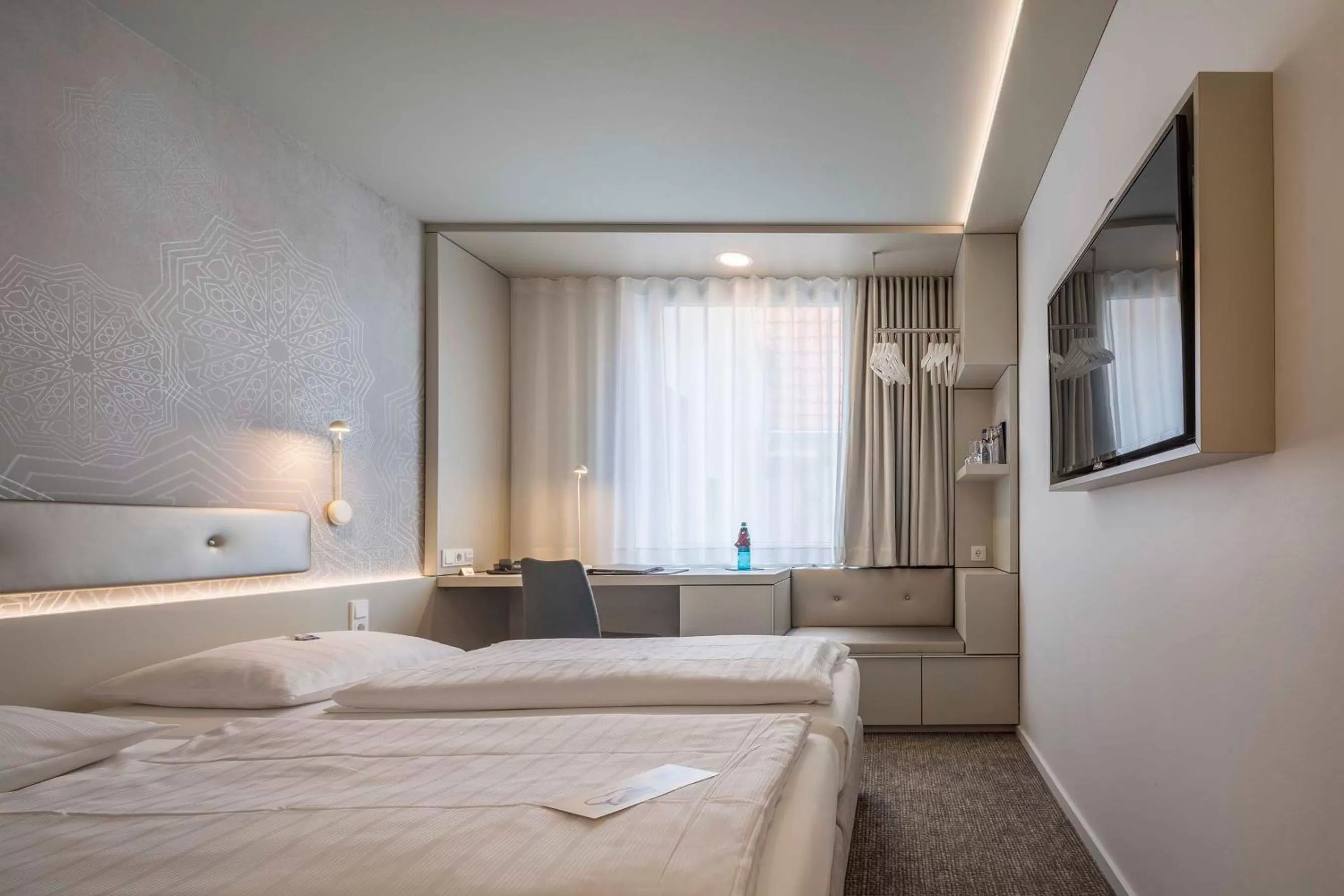 Photo of the whole room, Bed in Stadthotel Münster