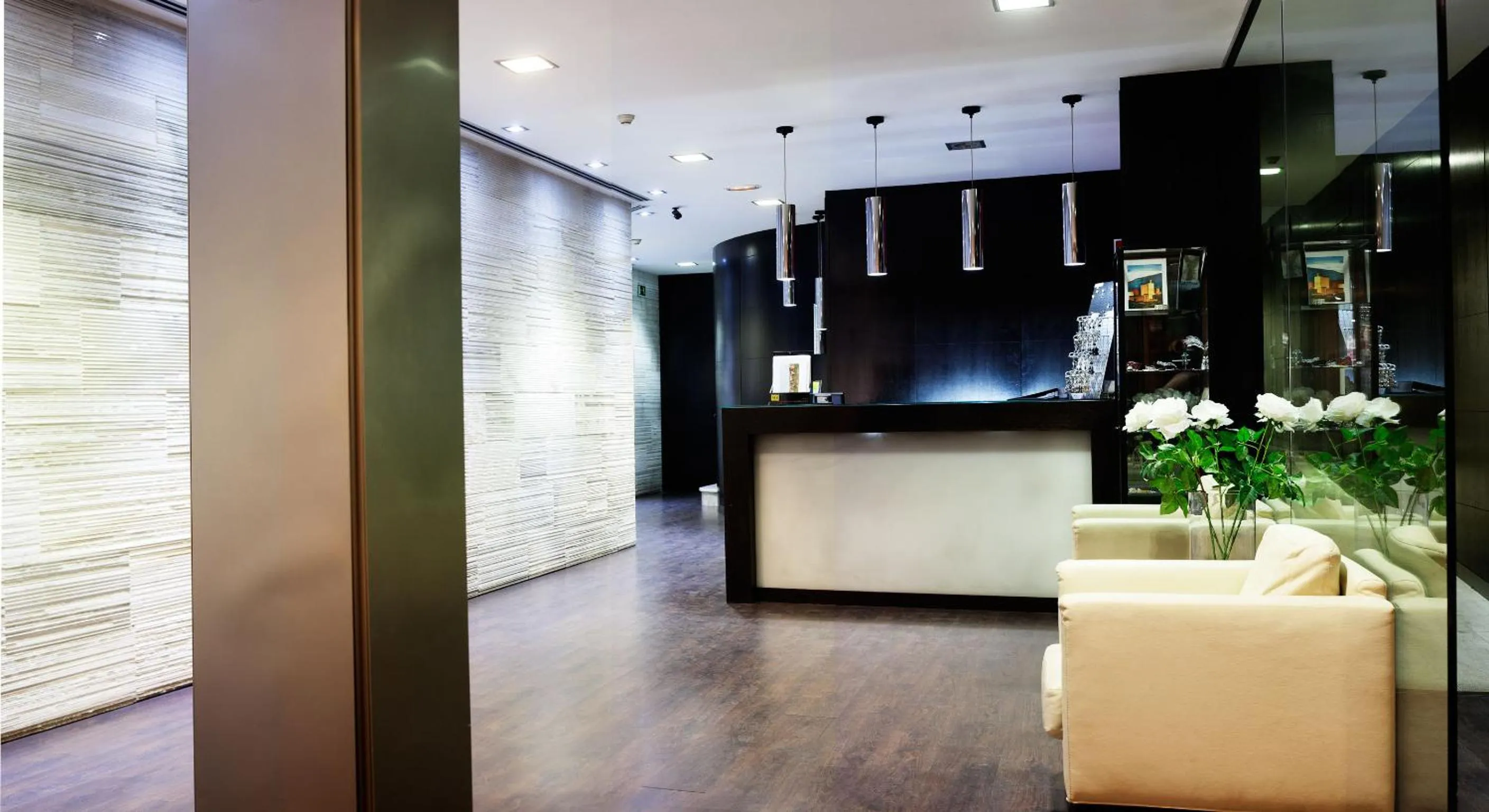 Lobby or reception in Hotel Universal by Maxi Hoteles