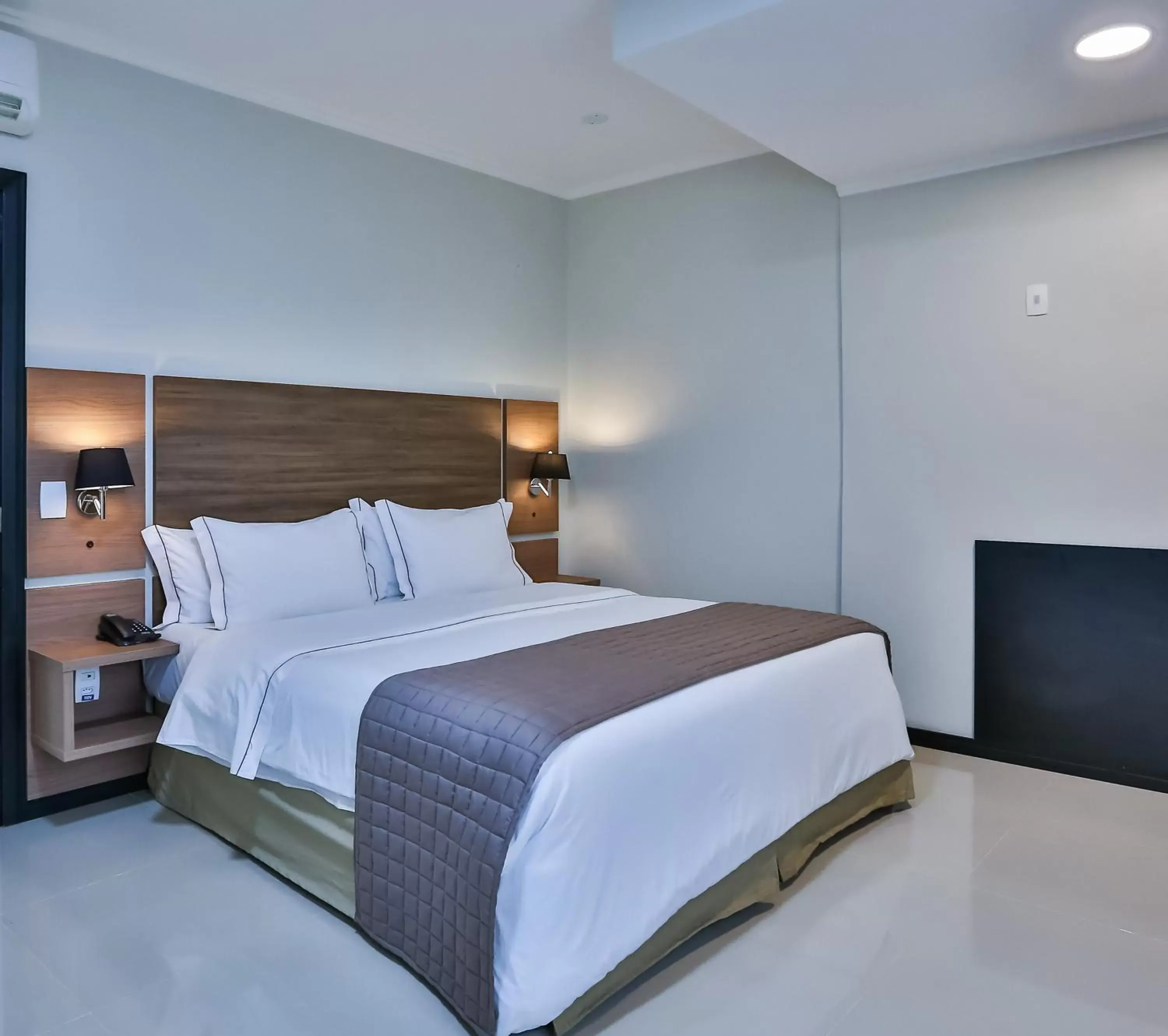 Bed in Wyndham Golden Foz Suítes Bed in Wyndham Golden Foz Suítes