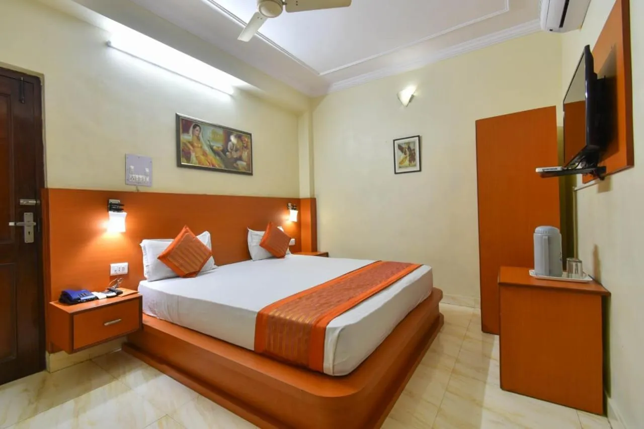 Bed in Hotel Jaisingh Palace