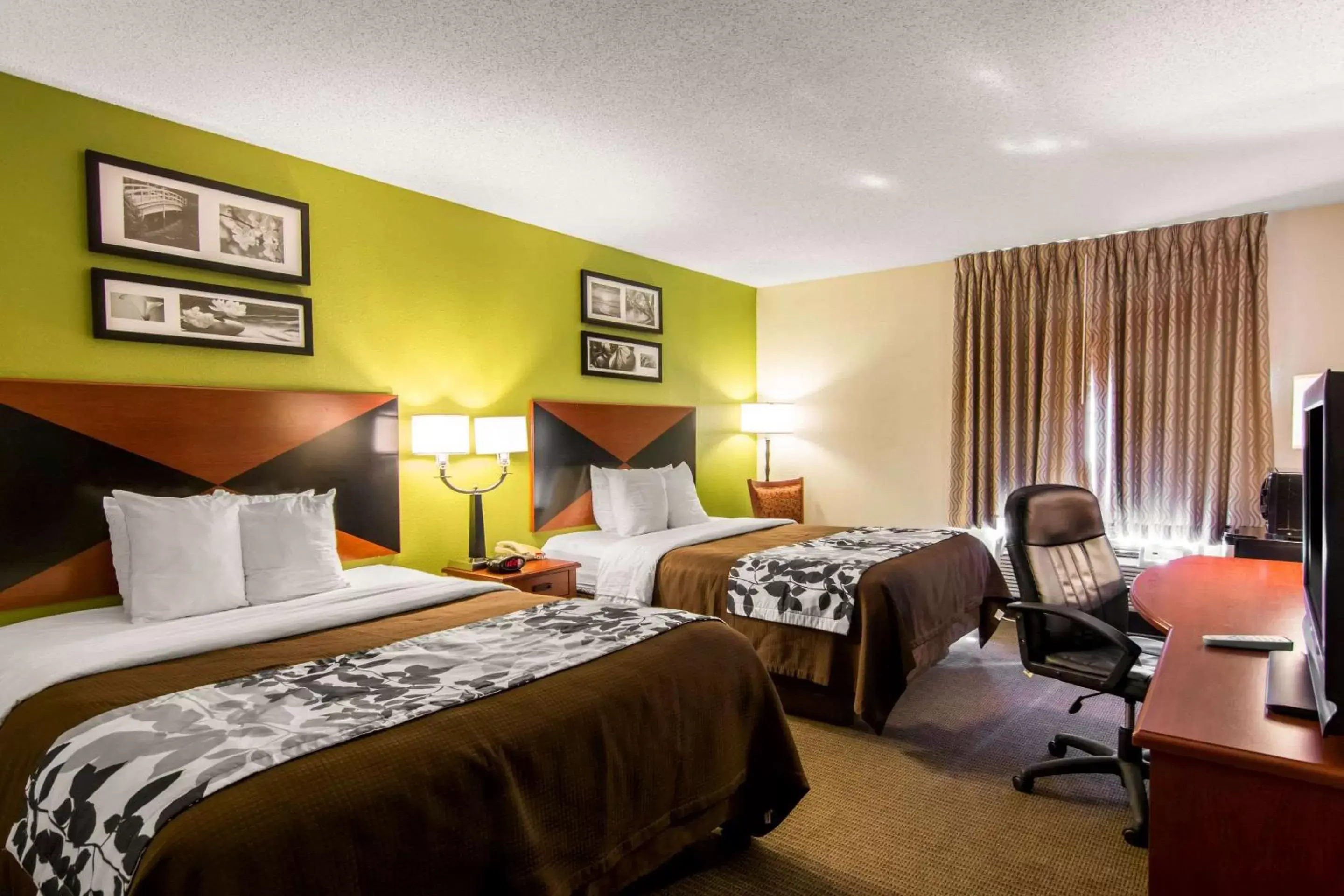 Photo of the whole room, Bed in Sleep Inn & Suites near Fort Gregg-Adams