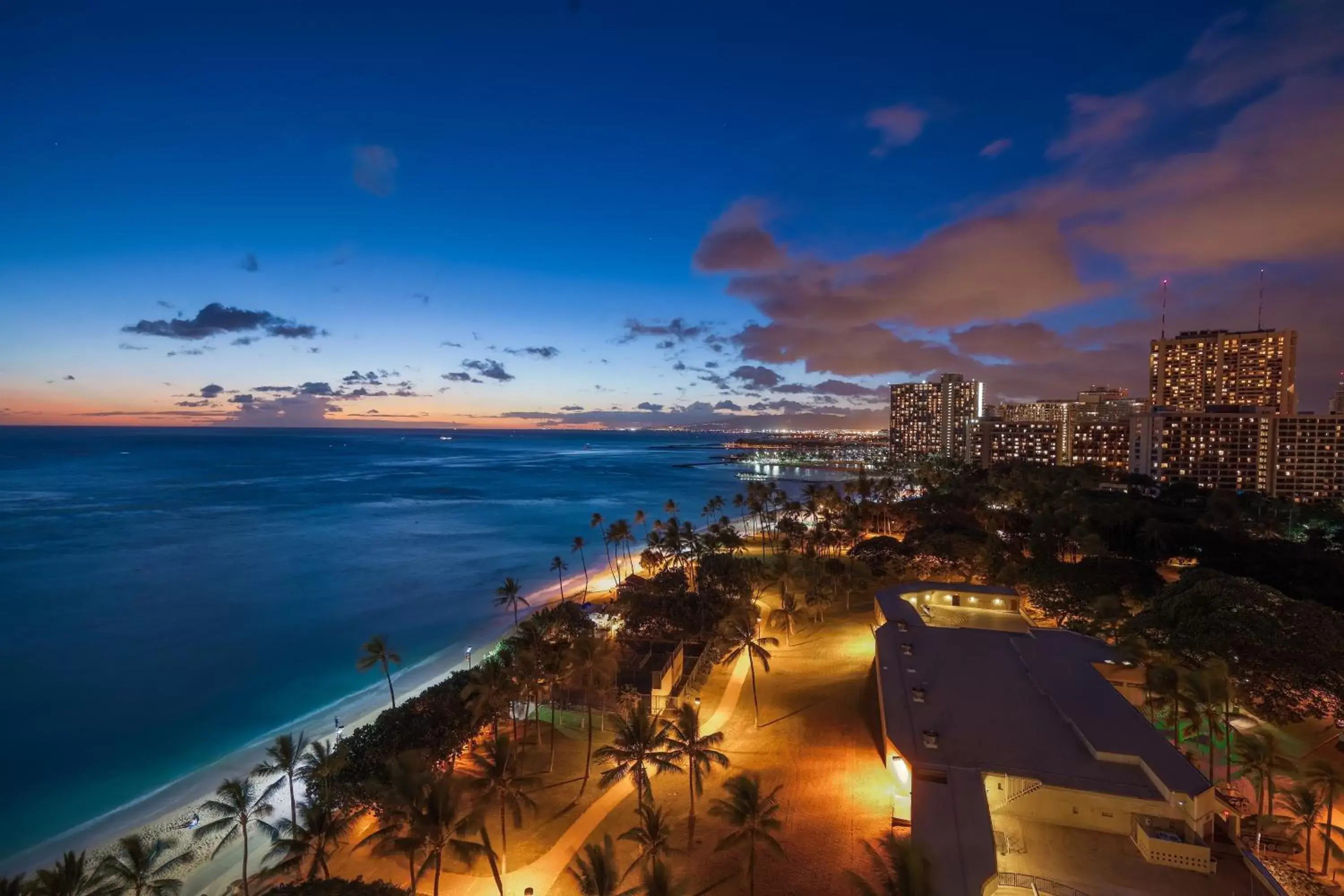 Sunset, Bird's-eye View in Castle Waikiki Shore Beachfront Condominiums
