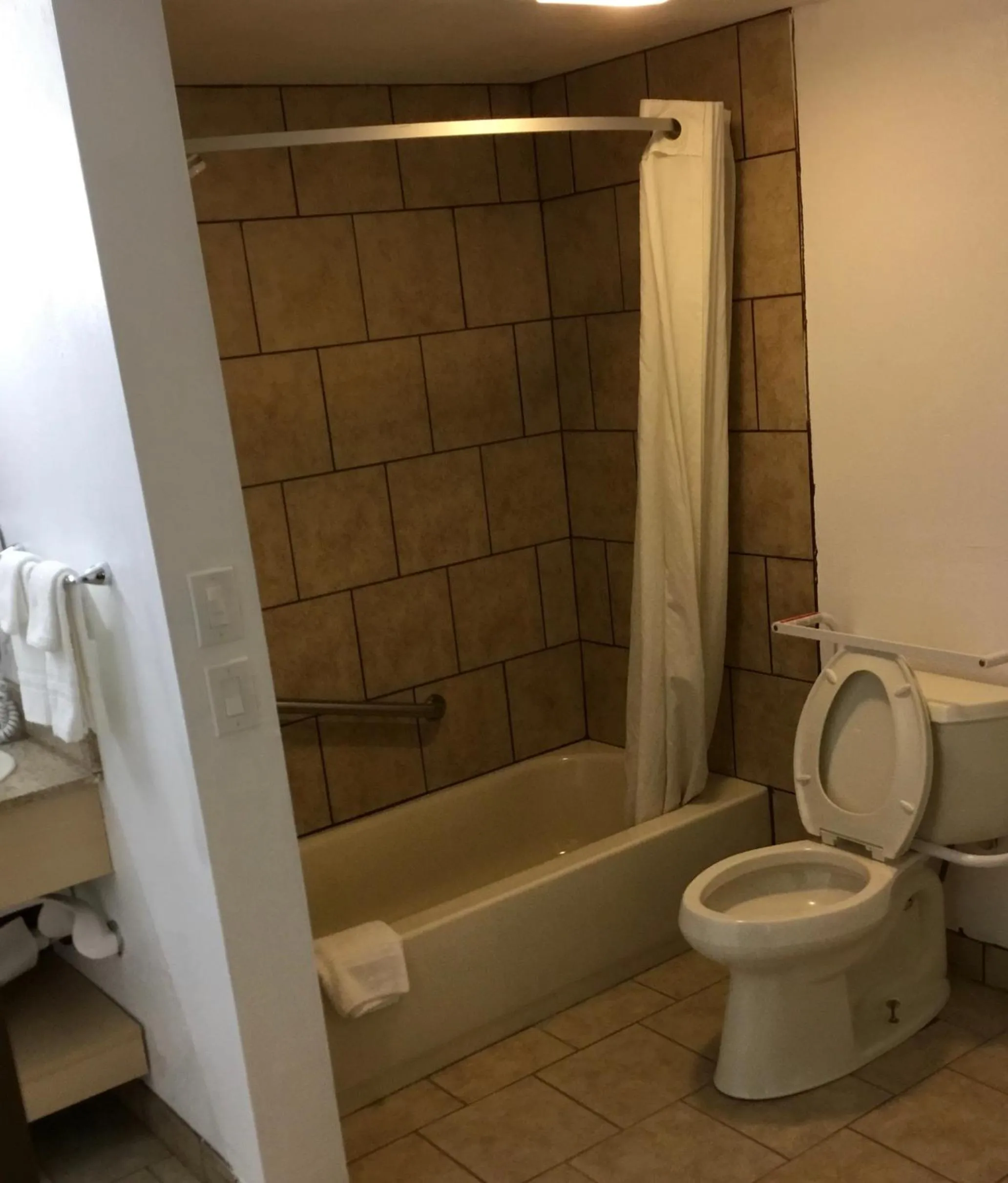 Toilet in Super 8 by Wyndham City of Moore