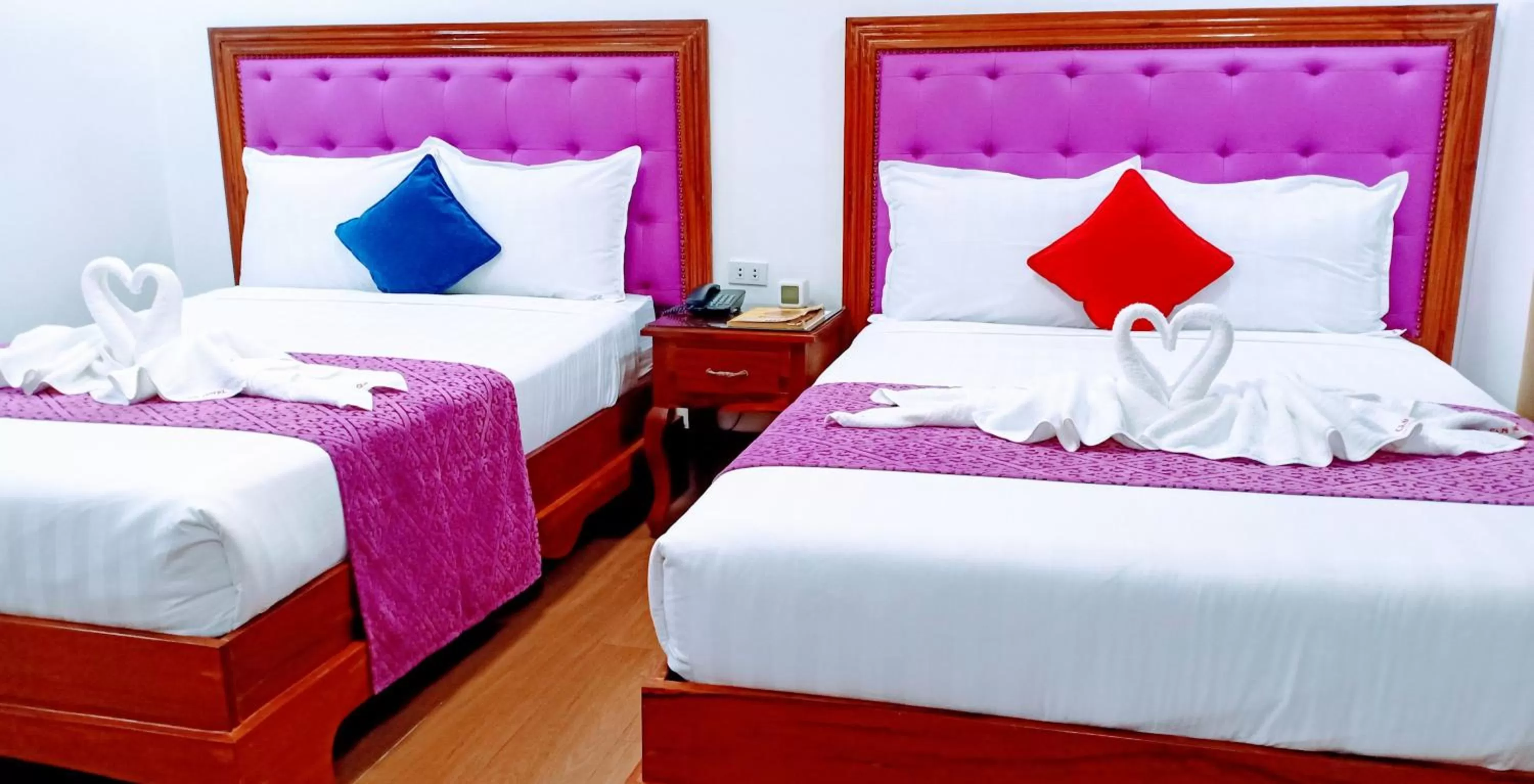 Bed in CLN Boutique Hotel
