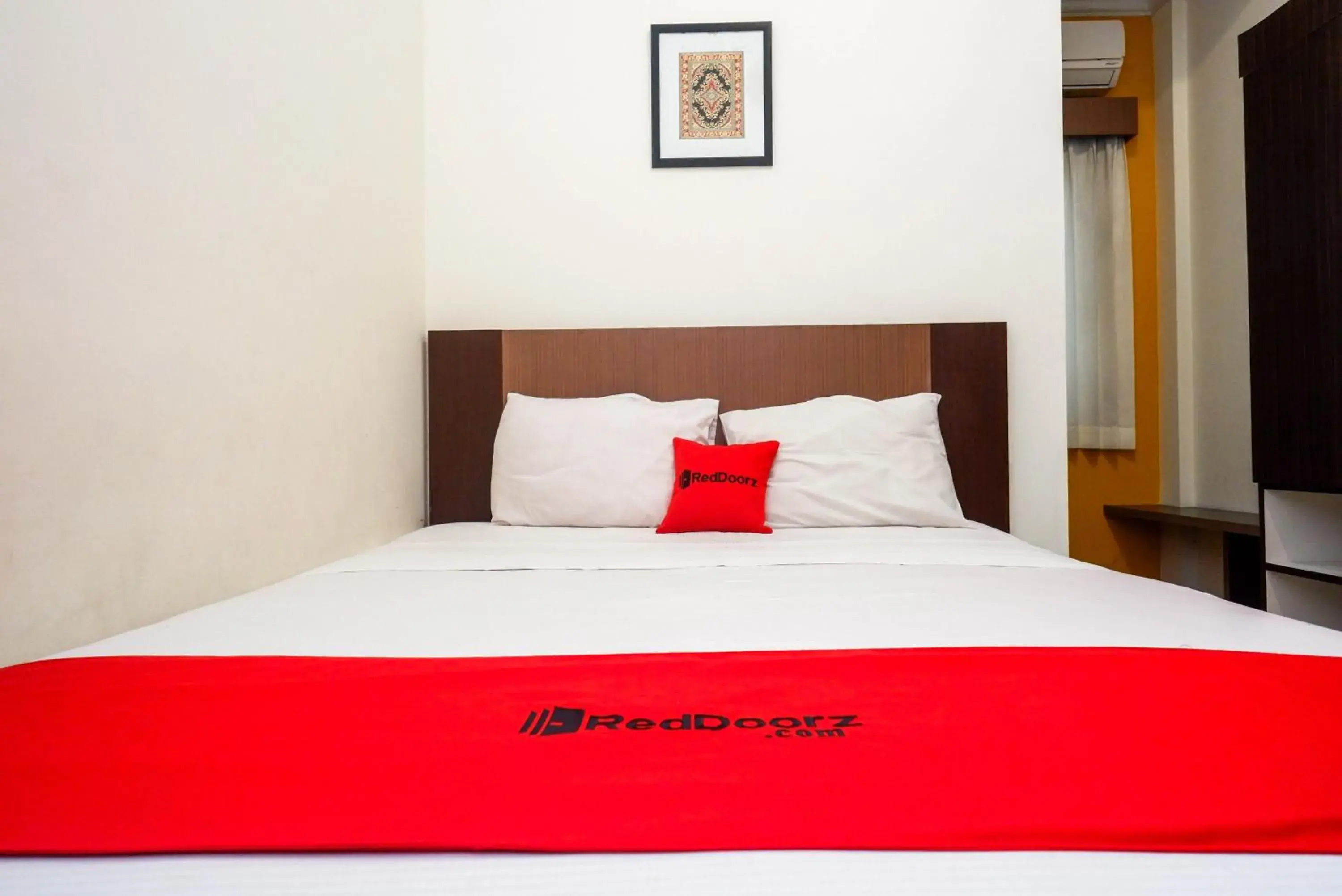 Bed in RedDoorz Syariah At Namira Hotel