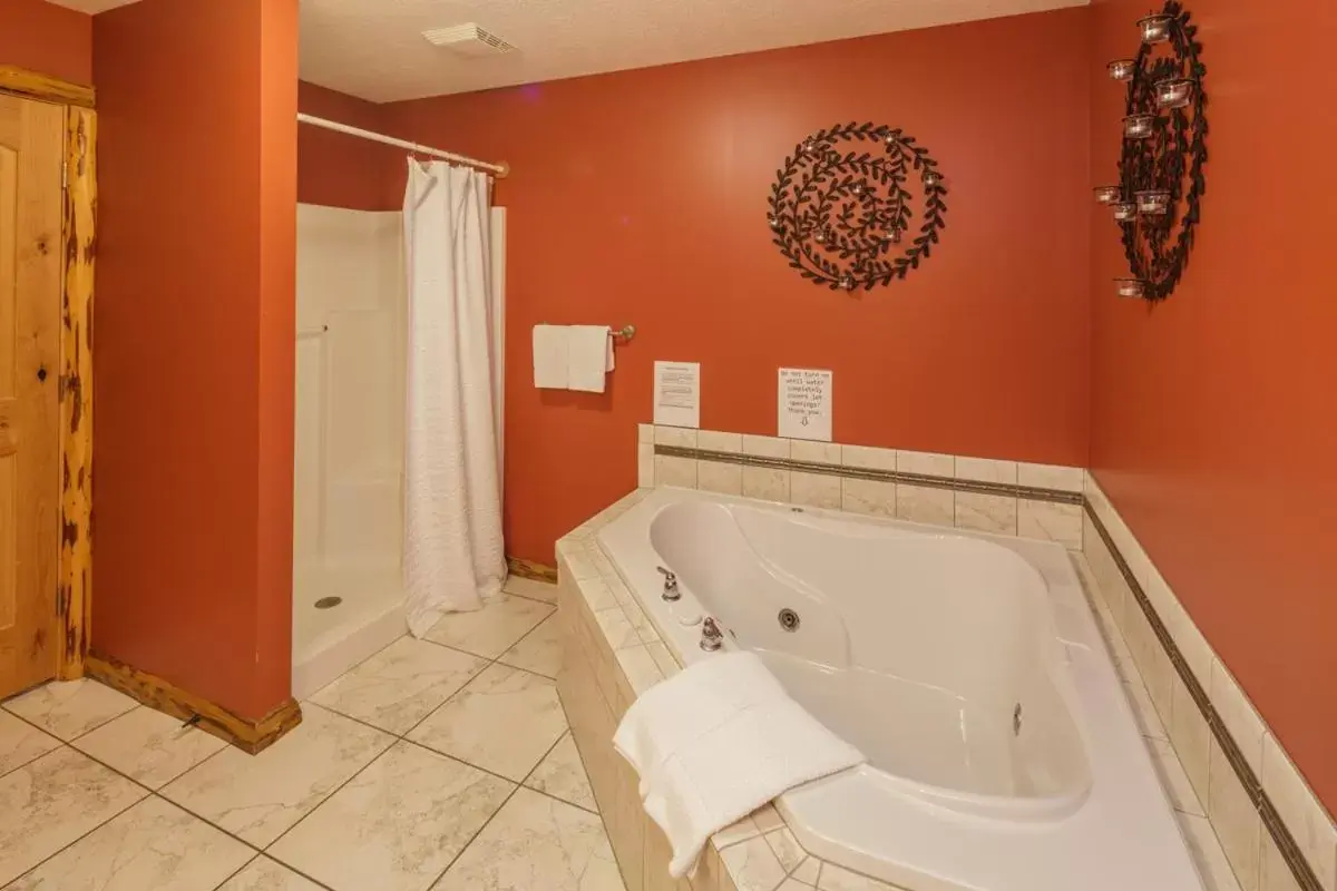 Bathroom in Sojourner's Lodge & Log Cabin Suites